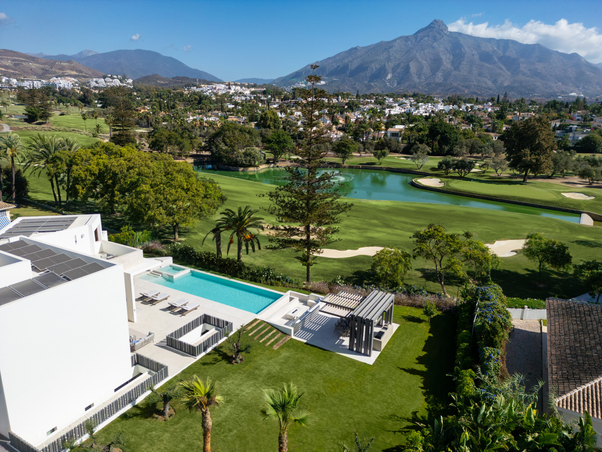 Stunning five bedroom, southeast facing exceptional property that was just built, offering a luxurious living experience with modern design and natural beauty.