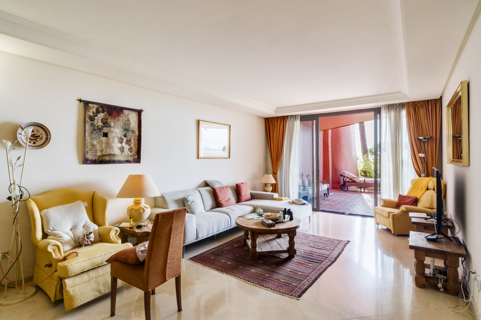 Impressive two bedroom, beach front ground floor apartment located in the luxury gated community of Menara Beach, Estepona.