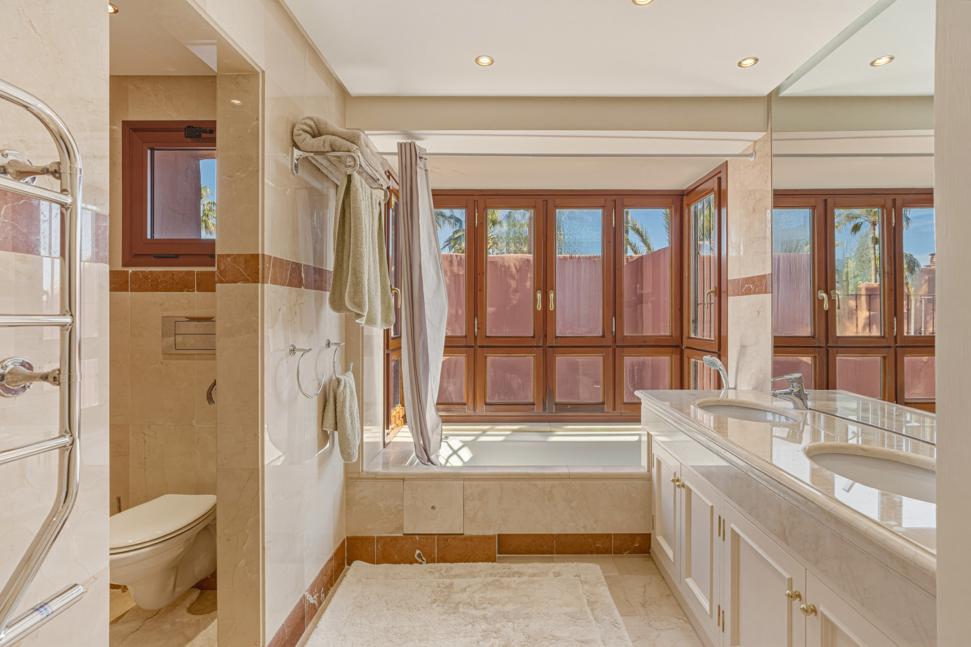 Fantastic south west facing three-bedroom duplex penthouse located in the prestigious gated beachfront community of Menara Beach, Estepona