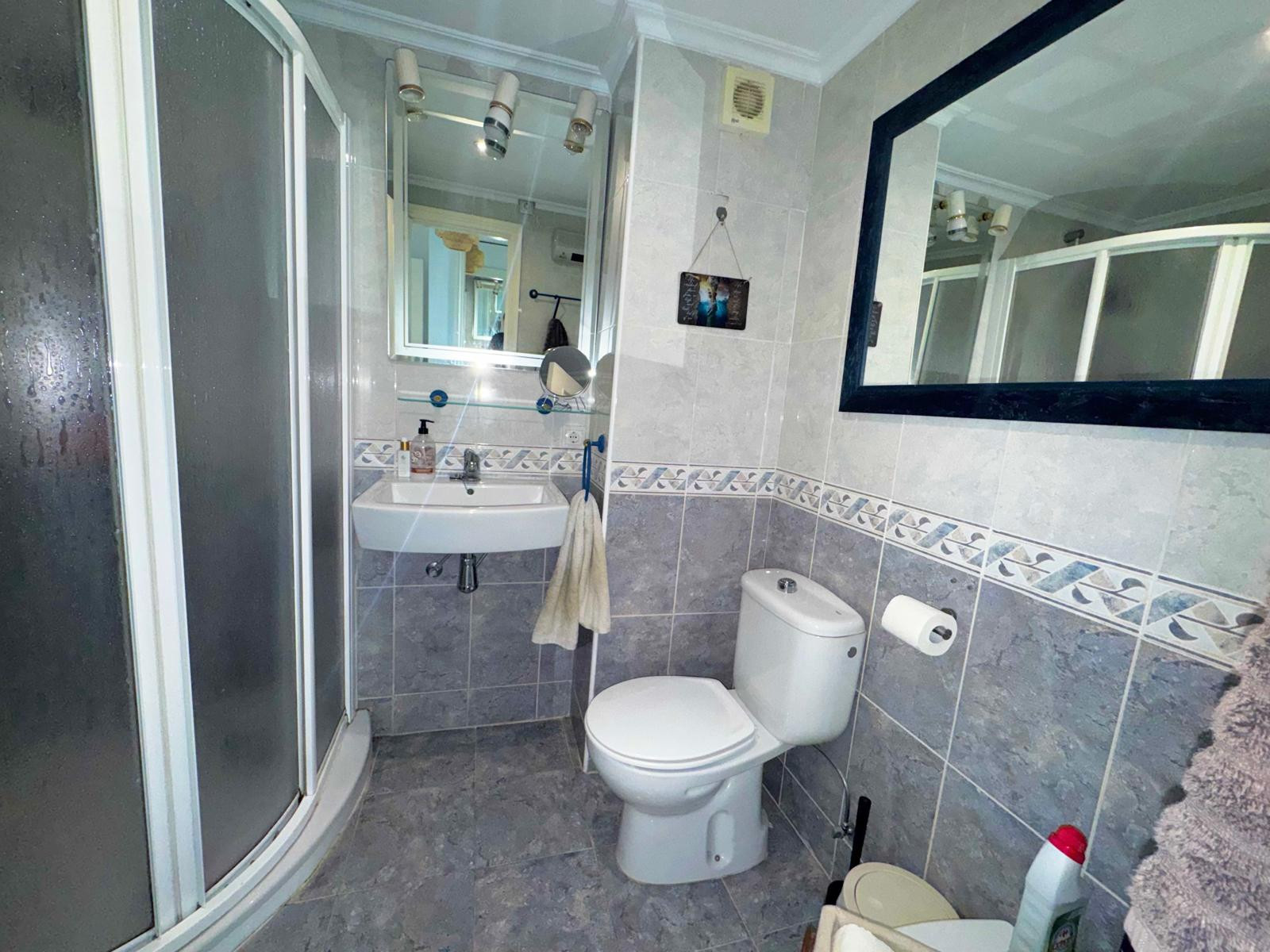 Fantastic two-bedroom, southwest-facing first-floor apartment in Calahonda with beautiful sea views