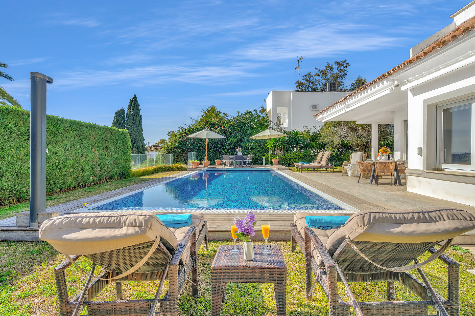 An inviting and characterful four-bedroom villa, Villa Molly offers a more rustic yet refined take on luxury living, set just 150 metres from Marbella's beautiful coastline.