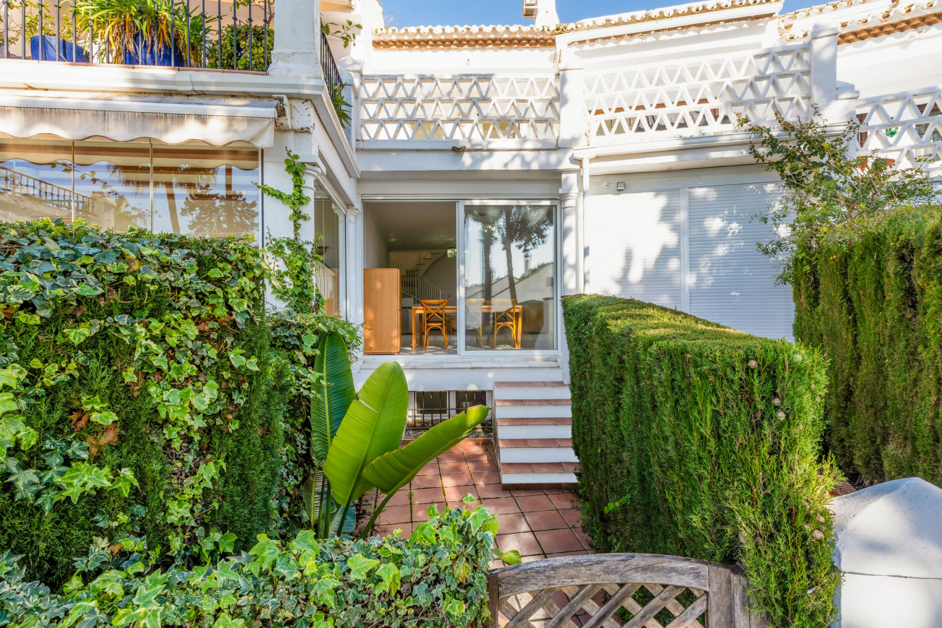 South-facing four-bedroom townhouse located in the gated community of Montepiedra , Nagueles within the Golden Mile, Marbella