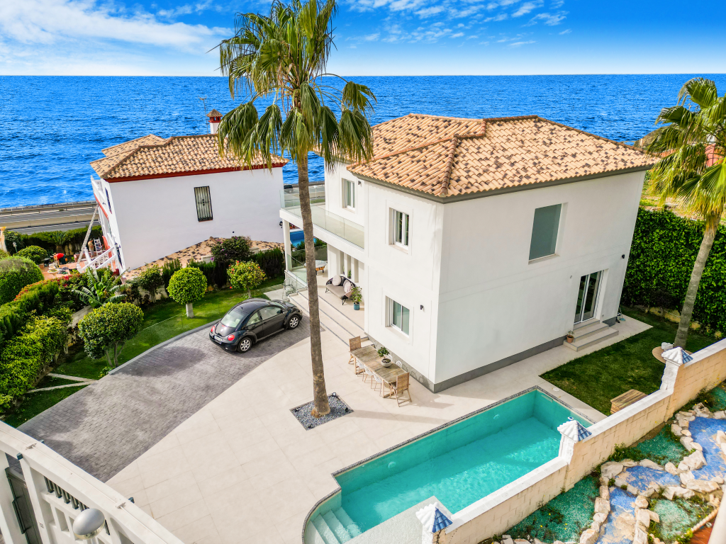 Beautifully renovated five bedroom south facing villa located near the beach...