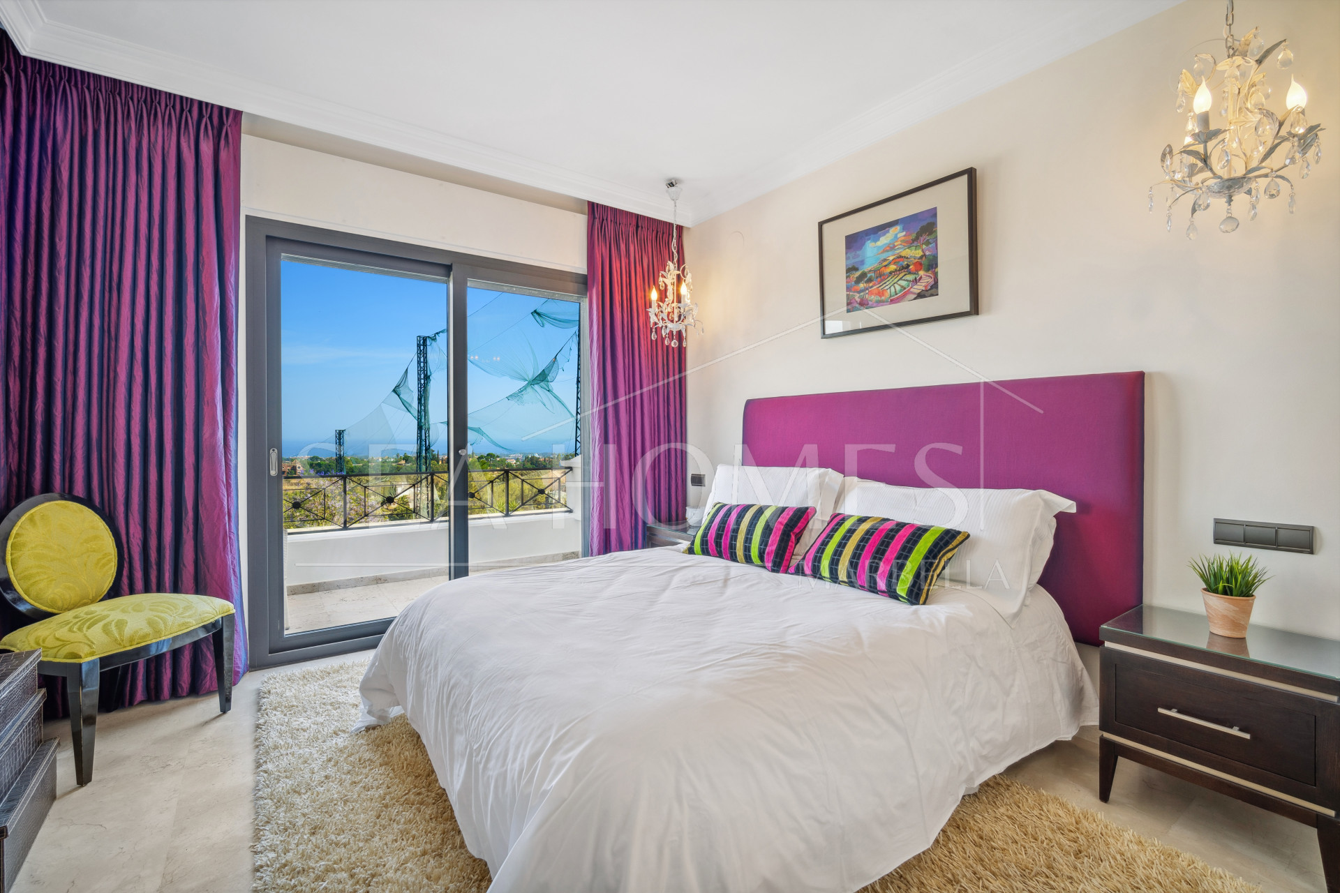 Impressive four-bedroom frontline golf villa in Los Arqueros, Benahavis with sea and mountain views
