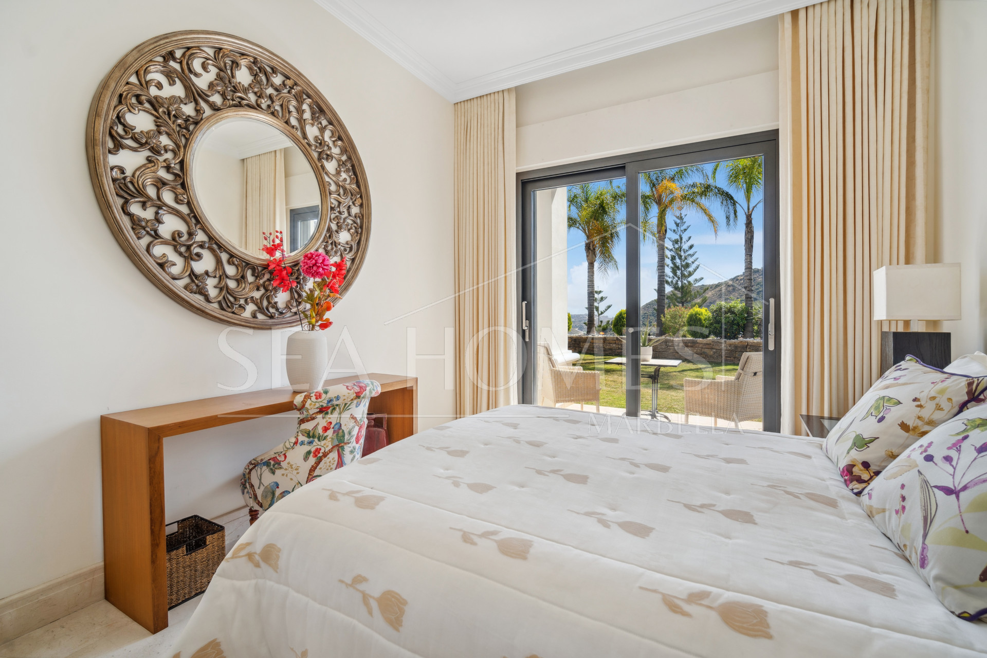 Impressive four-bedroom frontline golf villa in Los Arqueros, Benahavis with sea and mountain views