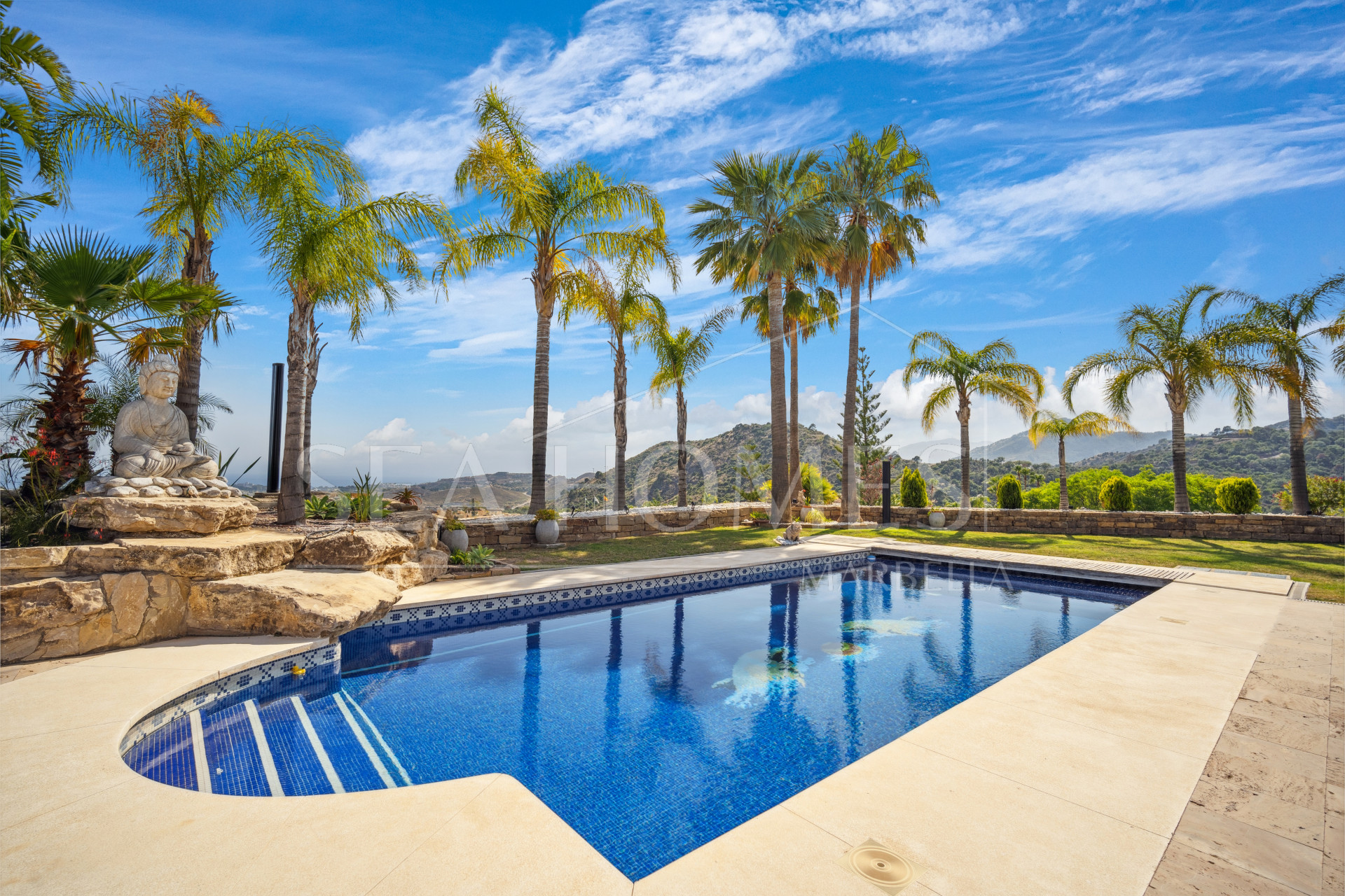 Impressive four-bedroom frontline golf villa in Los Arqueros, Benahavis with sea and mountain views