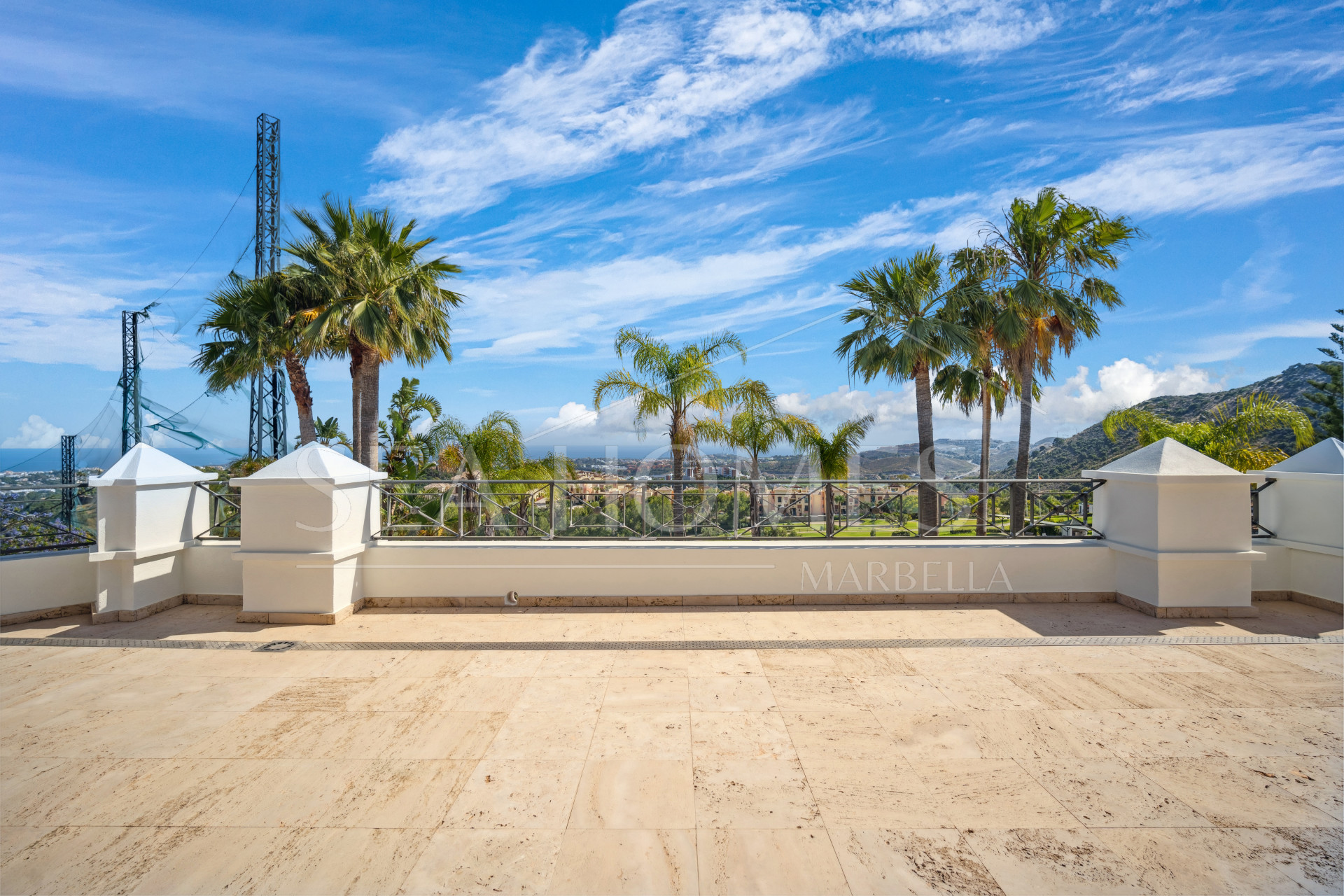 Impressive four-bedroom frontline golf villa in Los Arqueros, Benahavis with sea and mountain views