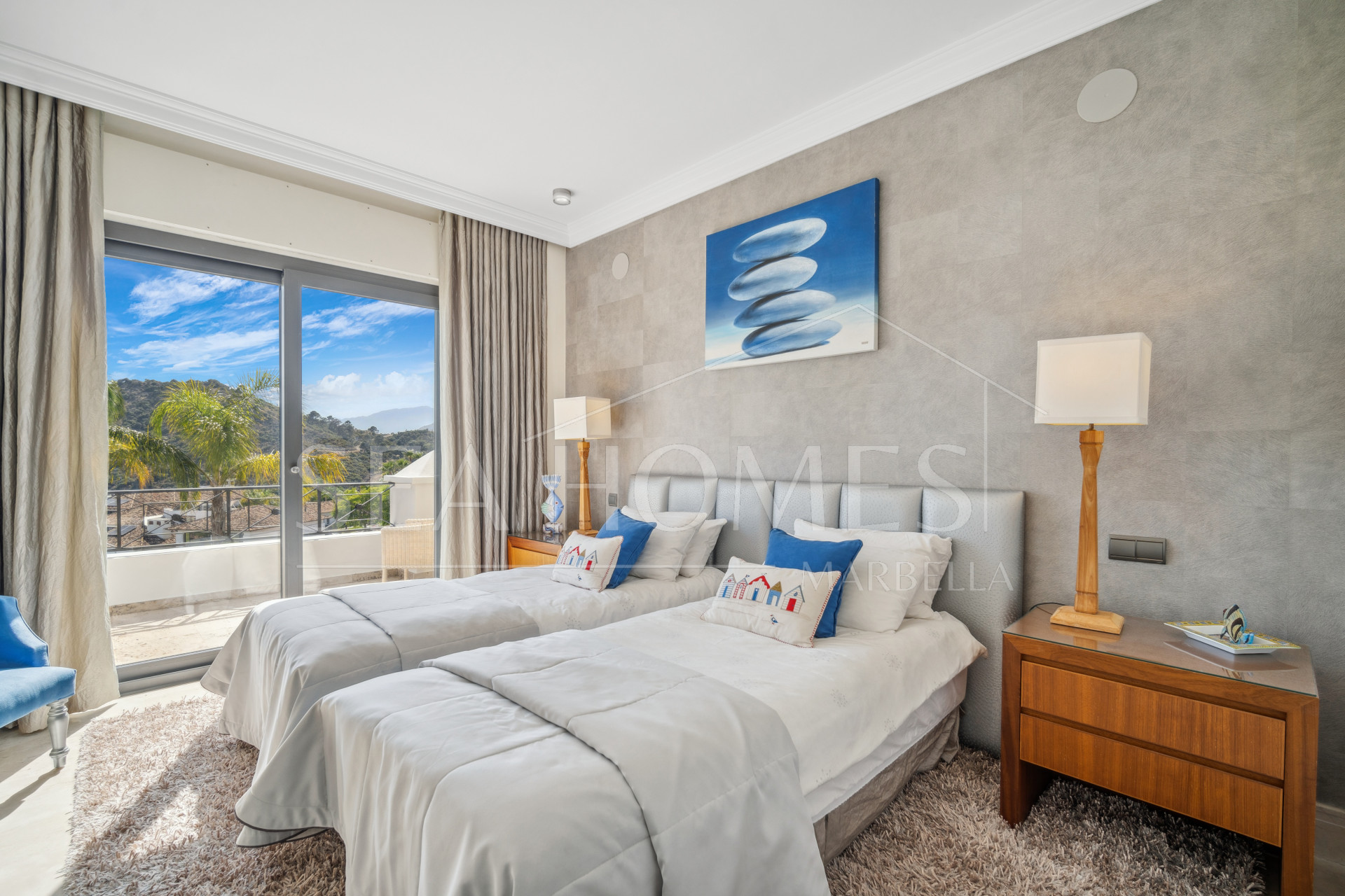 Impressive four-bedroom frontline golf villa in Los Arqueros, Benahavis with sea and mountain views