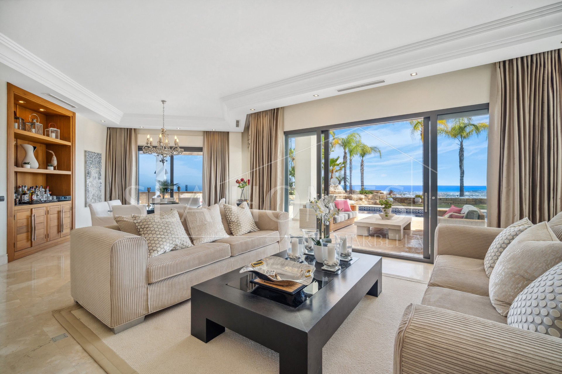 Impressive four-bedroom frontline golf villa in Los Arqueros, Benahavis with sea and mountain views