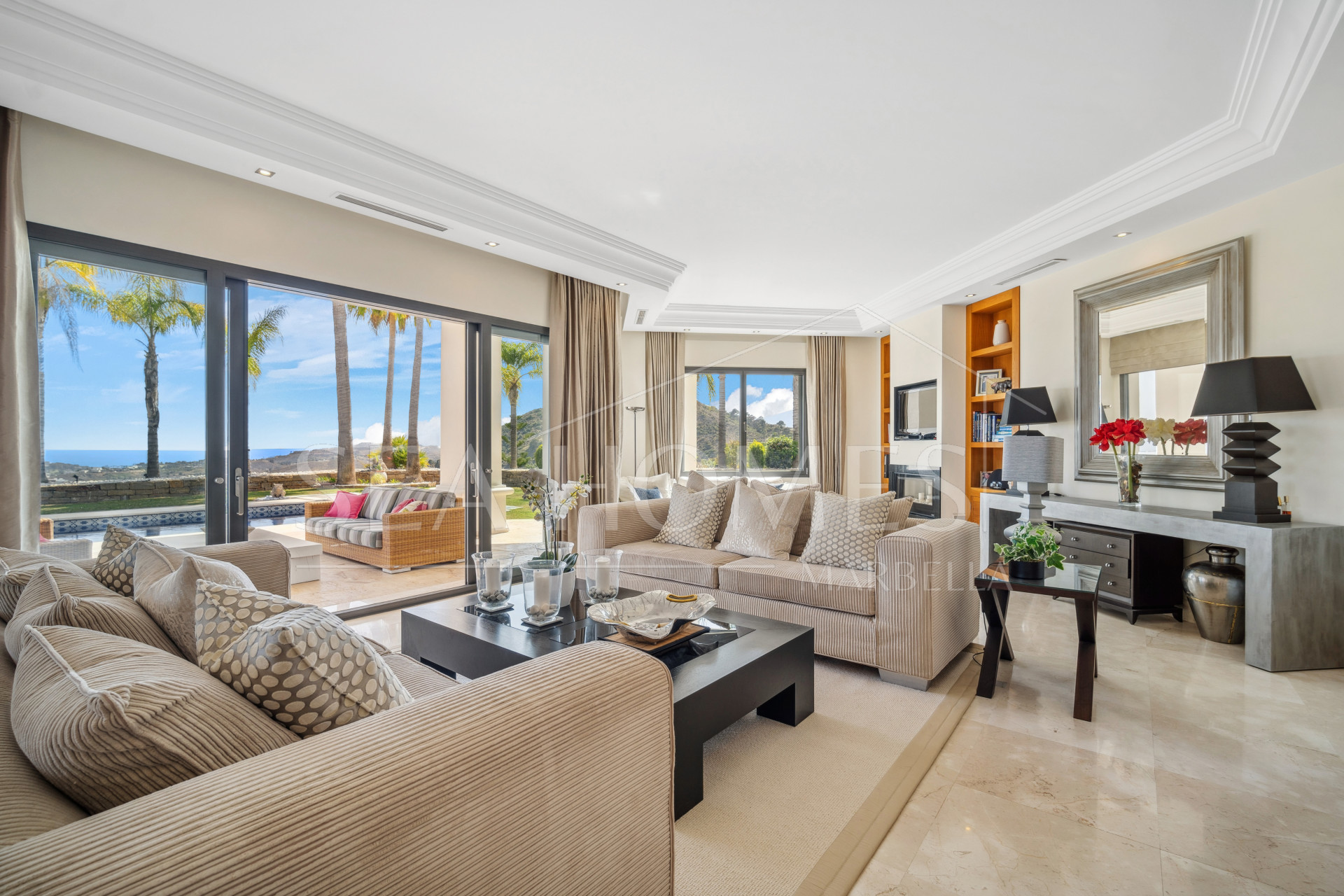Impressive four-bedroom frontline golf villa in Los Arqueros, Benahavis with sea and mountain views