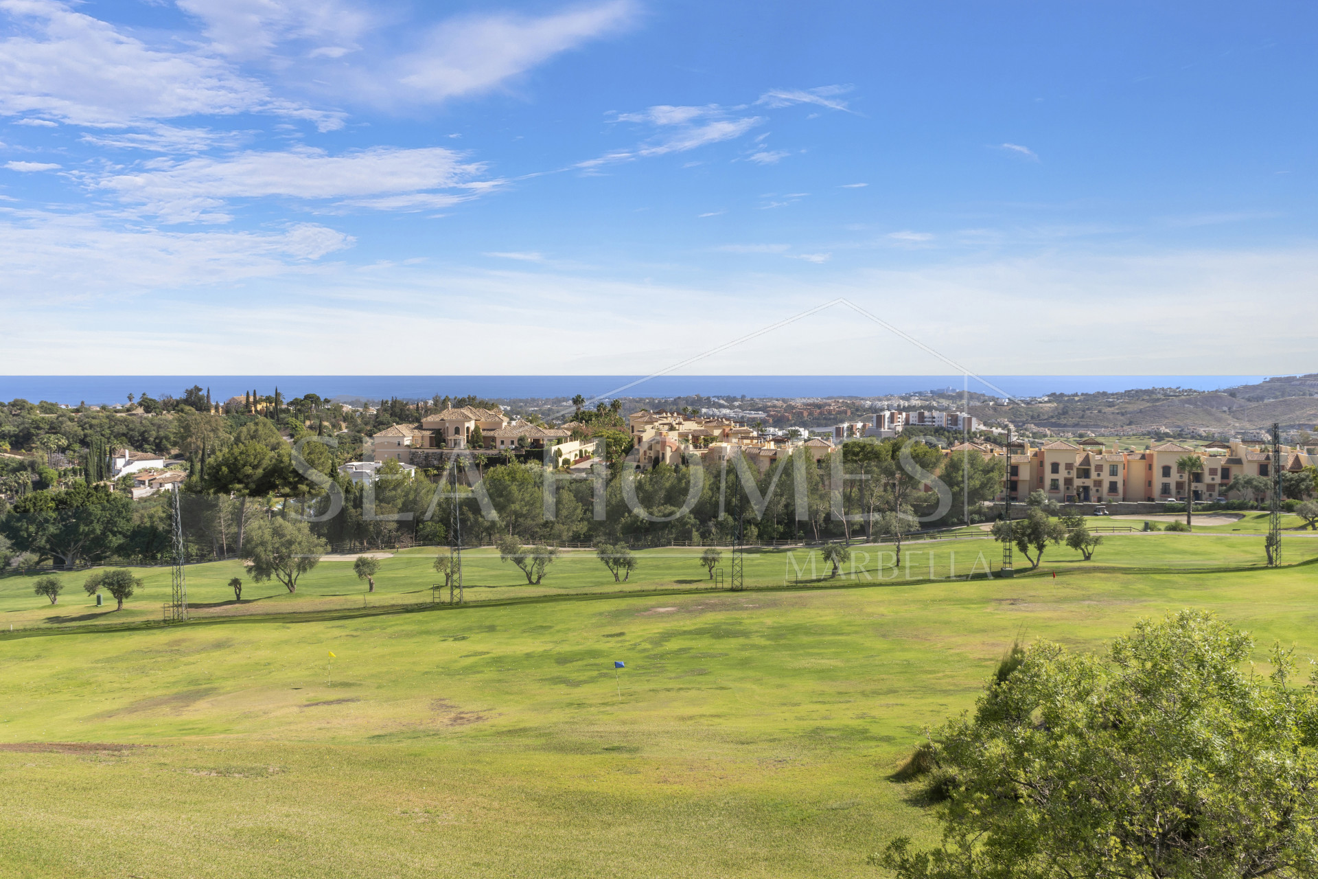Impressive four-bedroom frontline golf villa in Los Arqueros, Benahavis with sea and mountain views