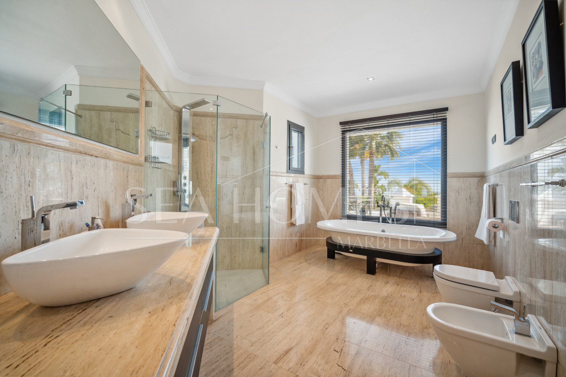 Impressive four-bedroom frontline golf villa in Los Arqueros, Benahavis with sea and mountain views