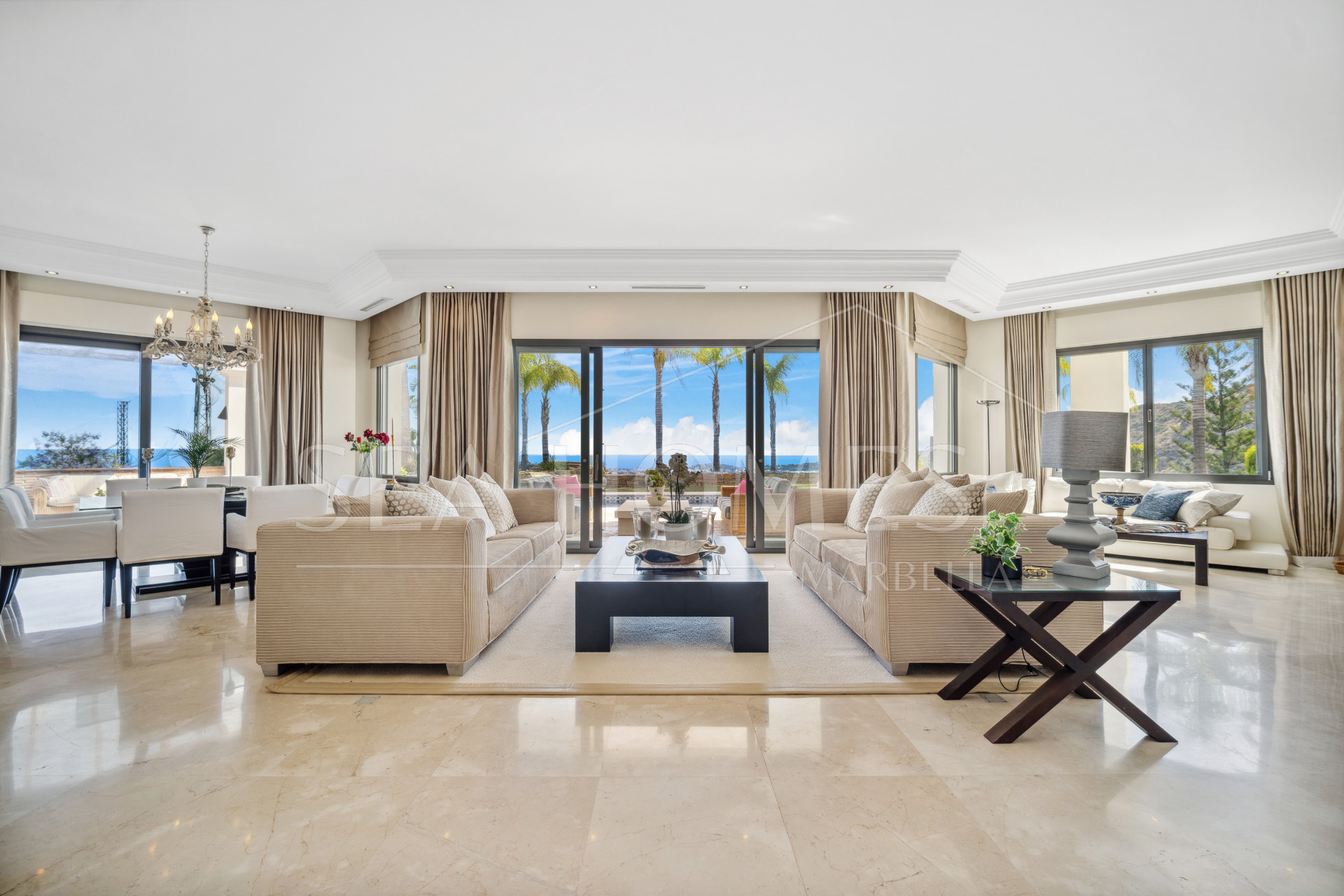 Impressive four-bedroom frontline golf villa in Los Arqueros, Benahavis with sea and mountain views