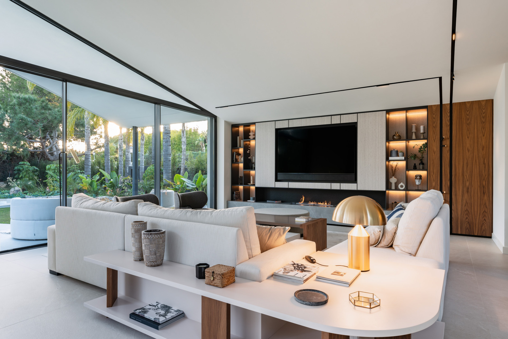 Relax and Unwind in Villa Lotus. A his magnificent home perfectly embodies sophistication and comfort in every detail with modern design and outstanding views into the green.