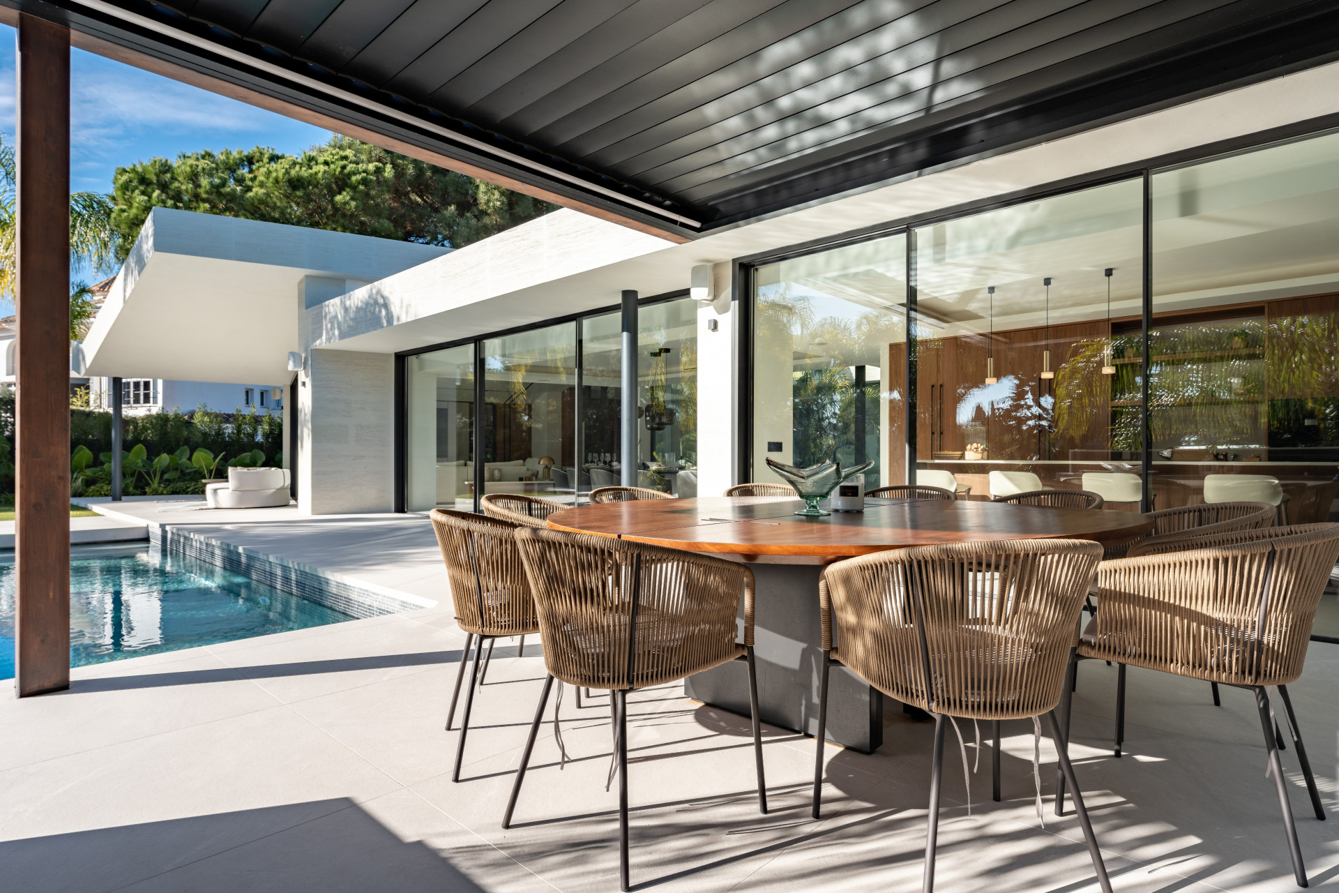 Relax and Unwind in Villa Lotus. A his magnificent home perfectly embodies sophistication and comfort in every detail with modern design and outstanding views into the green.