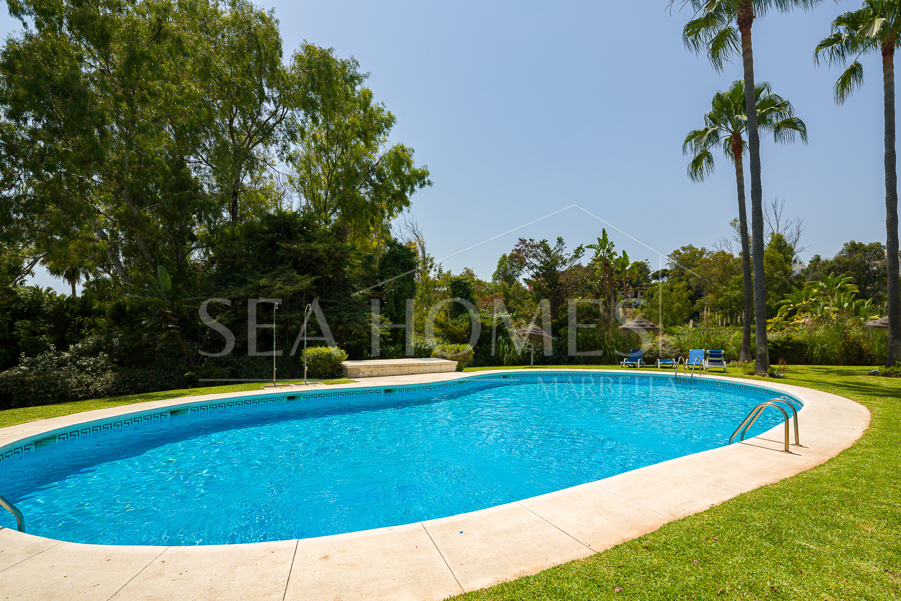 Stunning two bedroom south west facing elevated ground floor apartment in the heart of Marbella's Golden Mile