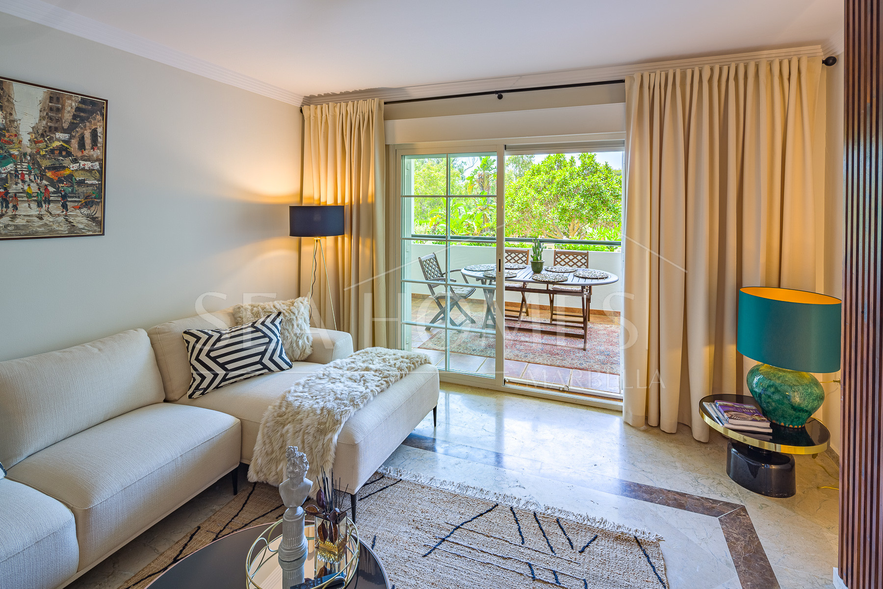 Stunning two bedroom south west facing elevated ground floor apartment in the heart of Marbella's Golden Mile