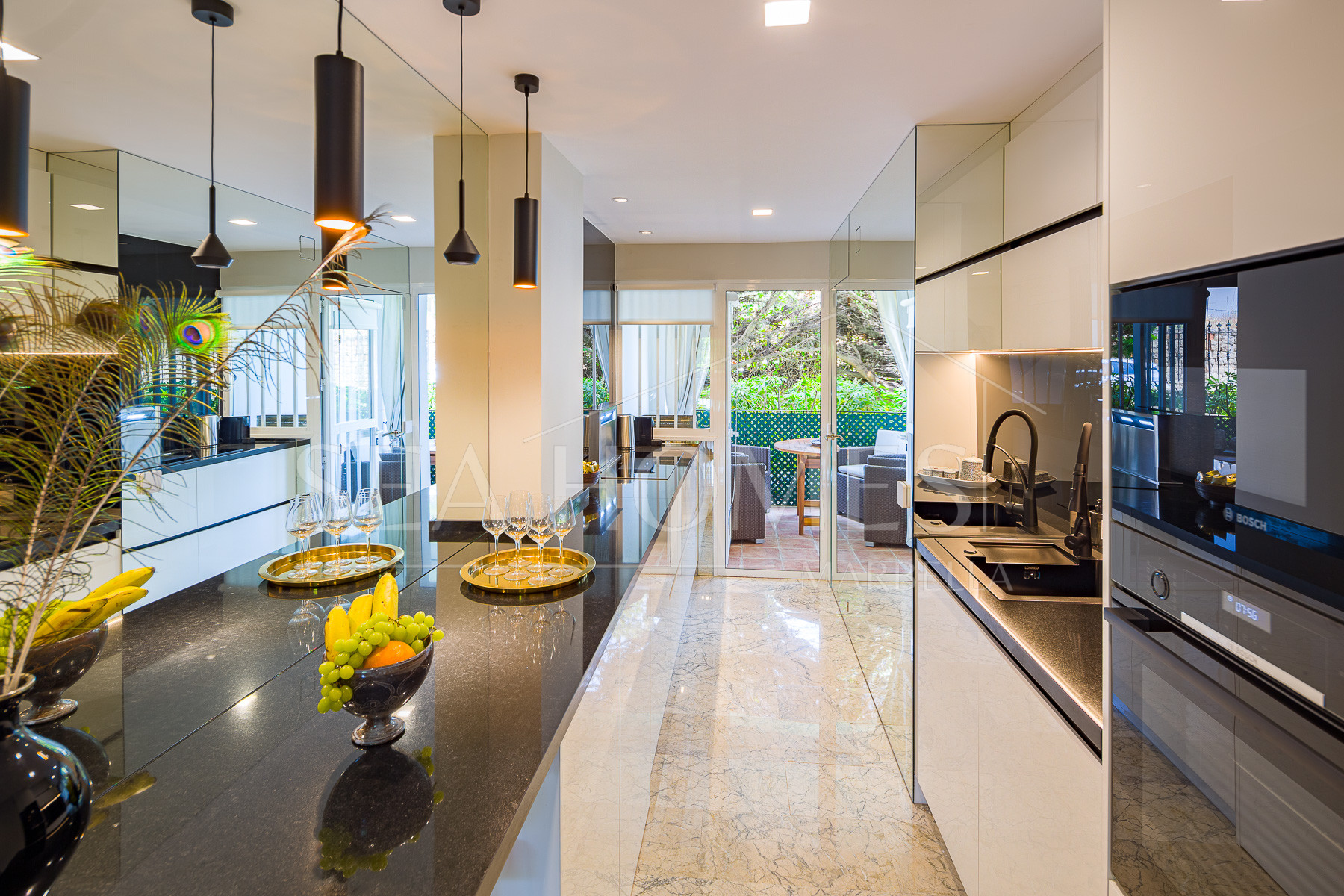 Stunning two bedroom south west facing elevated ground floor apartment in the heart of Marbella's Golden Mile