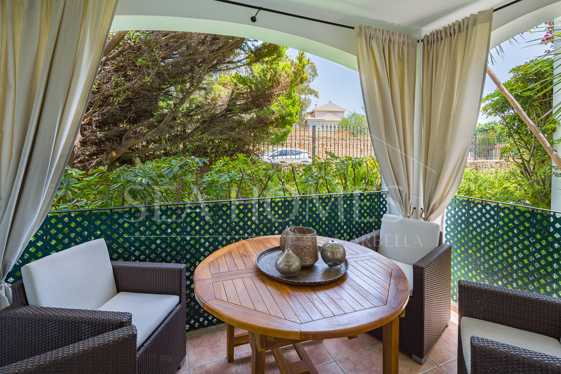 Stunning two bedroom south west facing elevated ground floor apartment in the heart of Marbella's Golden Mile