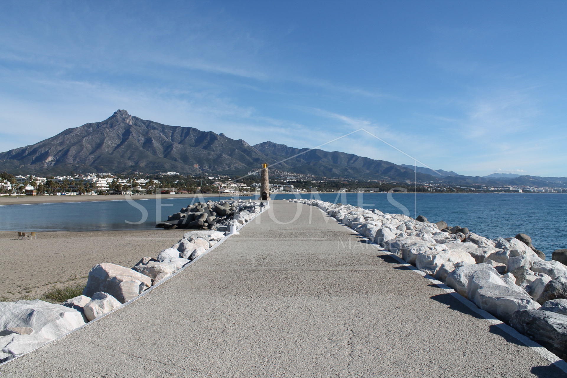 Stunning two bedroom south west facing elevated ground floor apartment in the heart of Marbella's Golden Mile