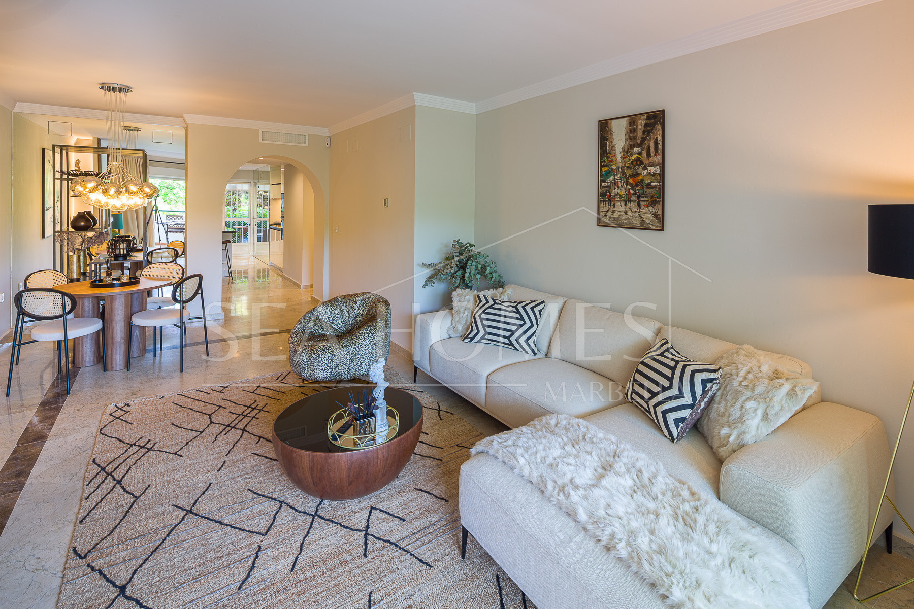 Stunning two bedroom south west facing elevated ground floor apartment in the heart of Marbella's Golden Mile