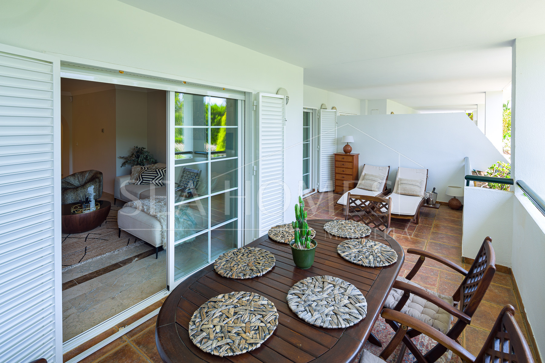 Stunning two bedroom south west facing elevated ground floor apartment in the heart of Marbella's Golden Mile