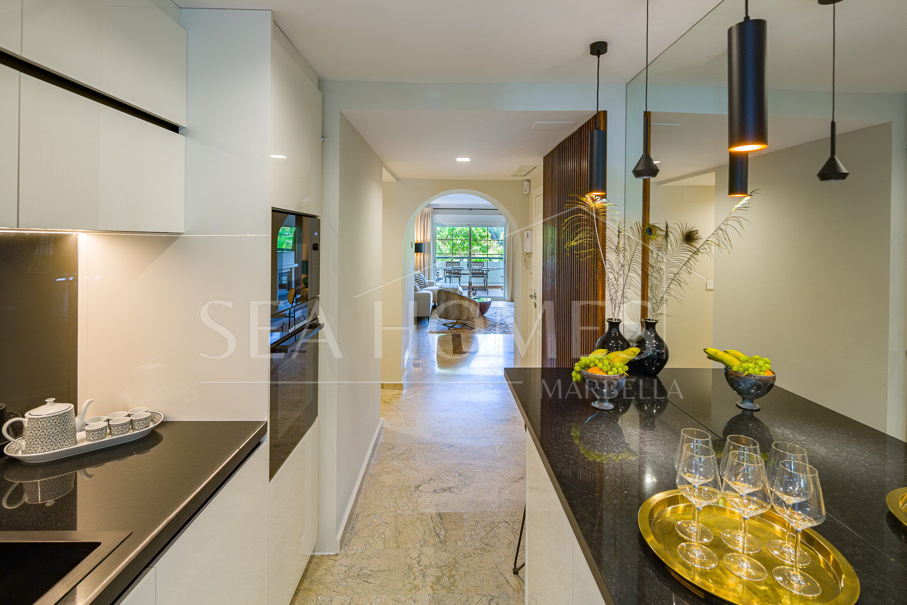 Stunning two bedroom south west facing elevated ground floor apartment in the heart of Marbella's Golden Mile