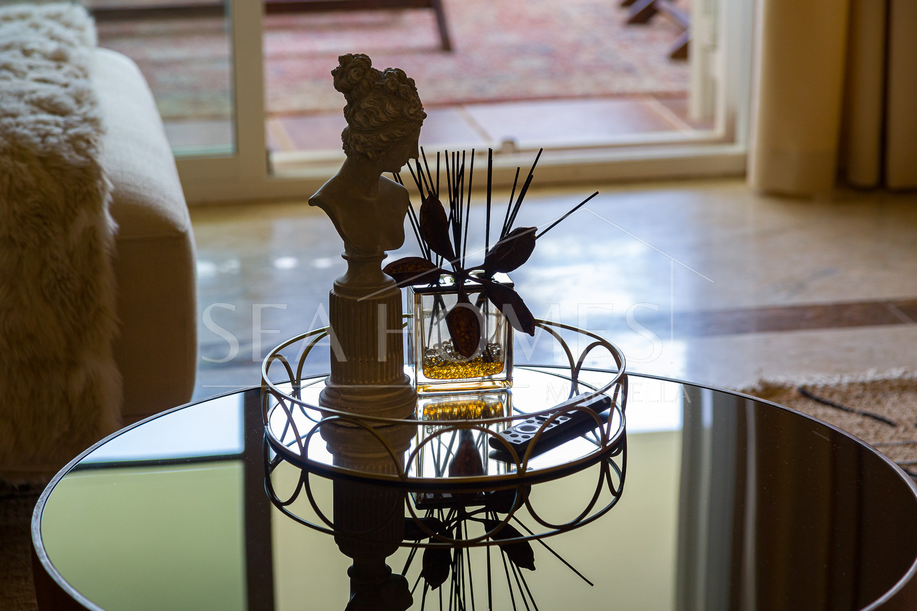 Stunning two bedroom south west facing elevated ground floor apartment in the heart of Marbella's Golden Mile