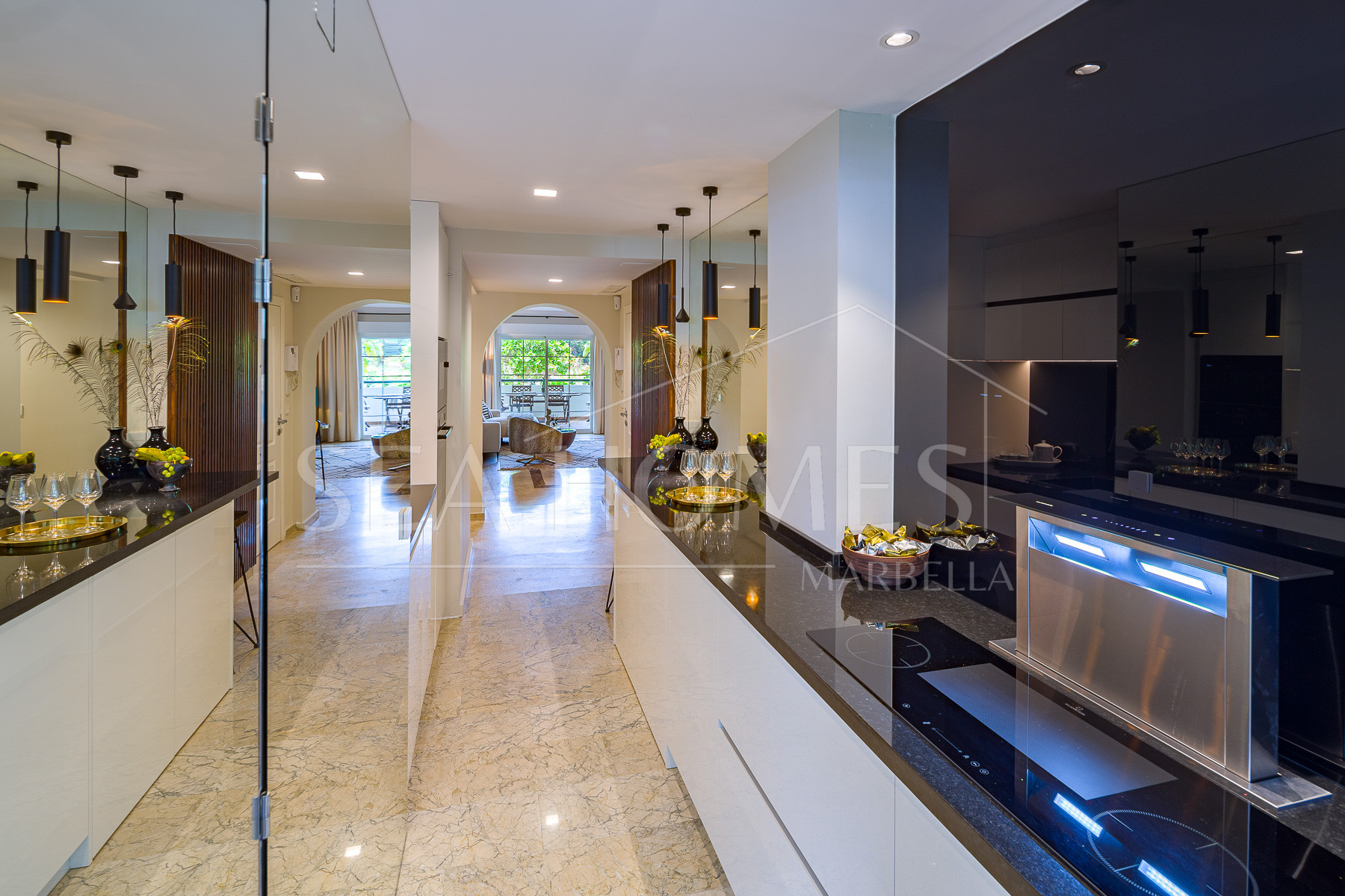 Stunning two bedroom south west facing elevated ground floor apartment in the heart of Marbella's Golden Mile