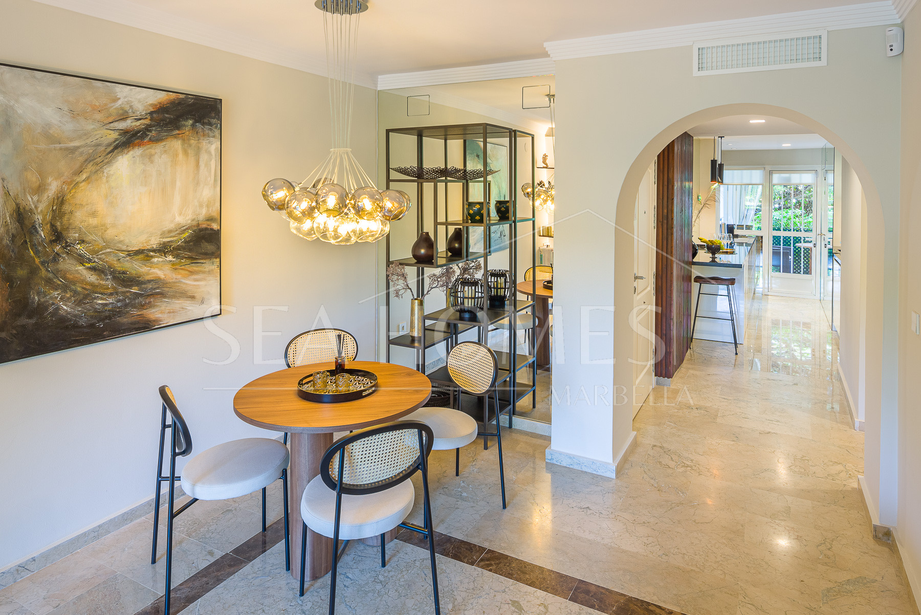 Stunning two bedroom south west facing elevated ground floor apartment in the heart of Marbella's Golden Mile