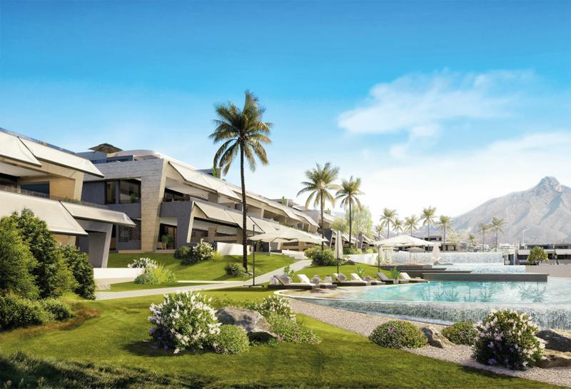 El área comunitaria de 6.000 m2 cuenta con una gran piscina, solárium y jardín paisajístico, todo en un estilo contemporáneo para servir como el marco perfecto para nuestras exclusivas casas de estilo moderno.