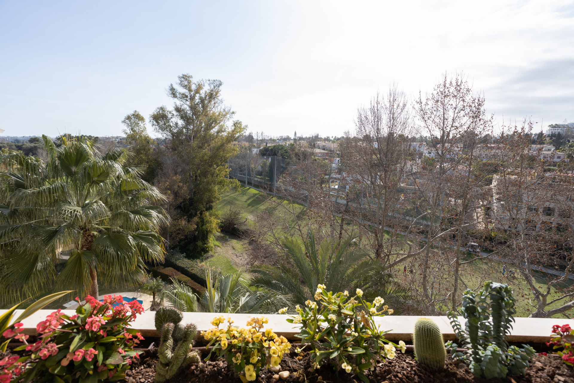 Stunning Southwest corner duplex penthouse first line of Guadalmina Alta golf course with panoramic views in Marbella.