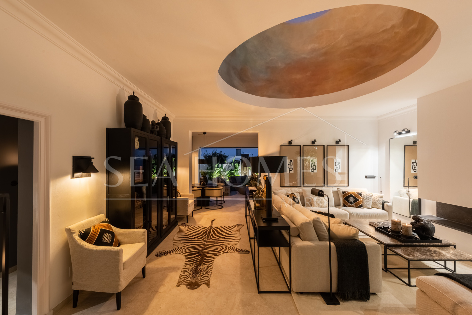 Scandi-style design bungalow in the beachfront Oasis Club on Marbella's Golden Mile.