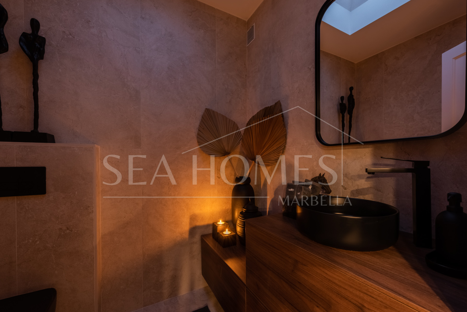 Scandi-style design bungalow in the beachfront Oasis Club on Marbella's Golden Mile.