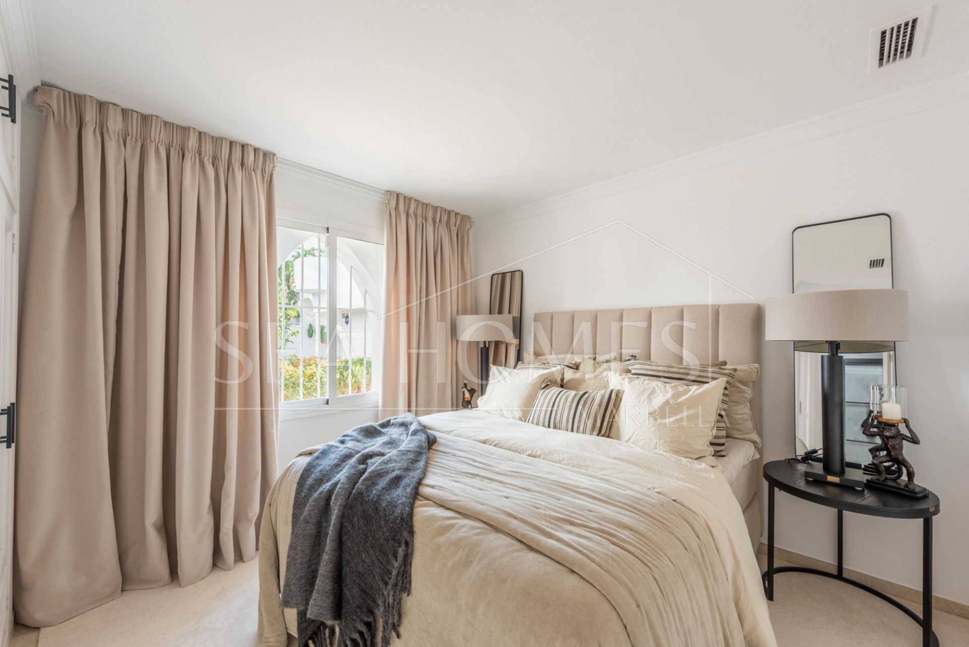 Scandi-style design bungalow in the beachfront Oasis Club on Marbella's Golden Mile.