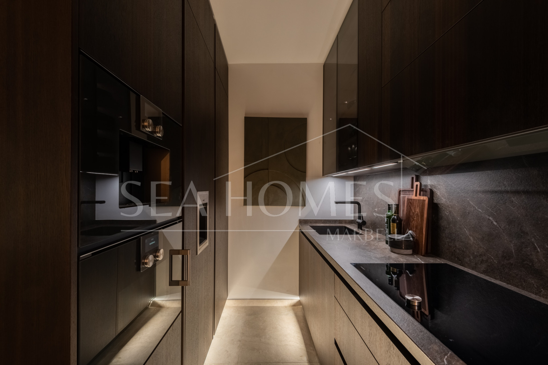 Scandi-style design bungalow in the beachfront Oasis Club on Marbella's Golden Mile.