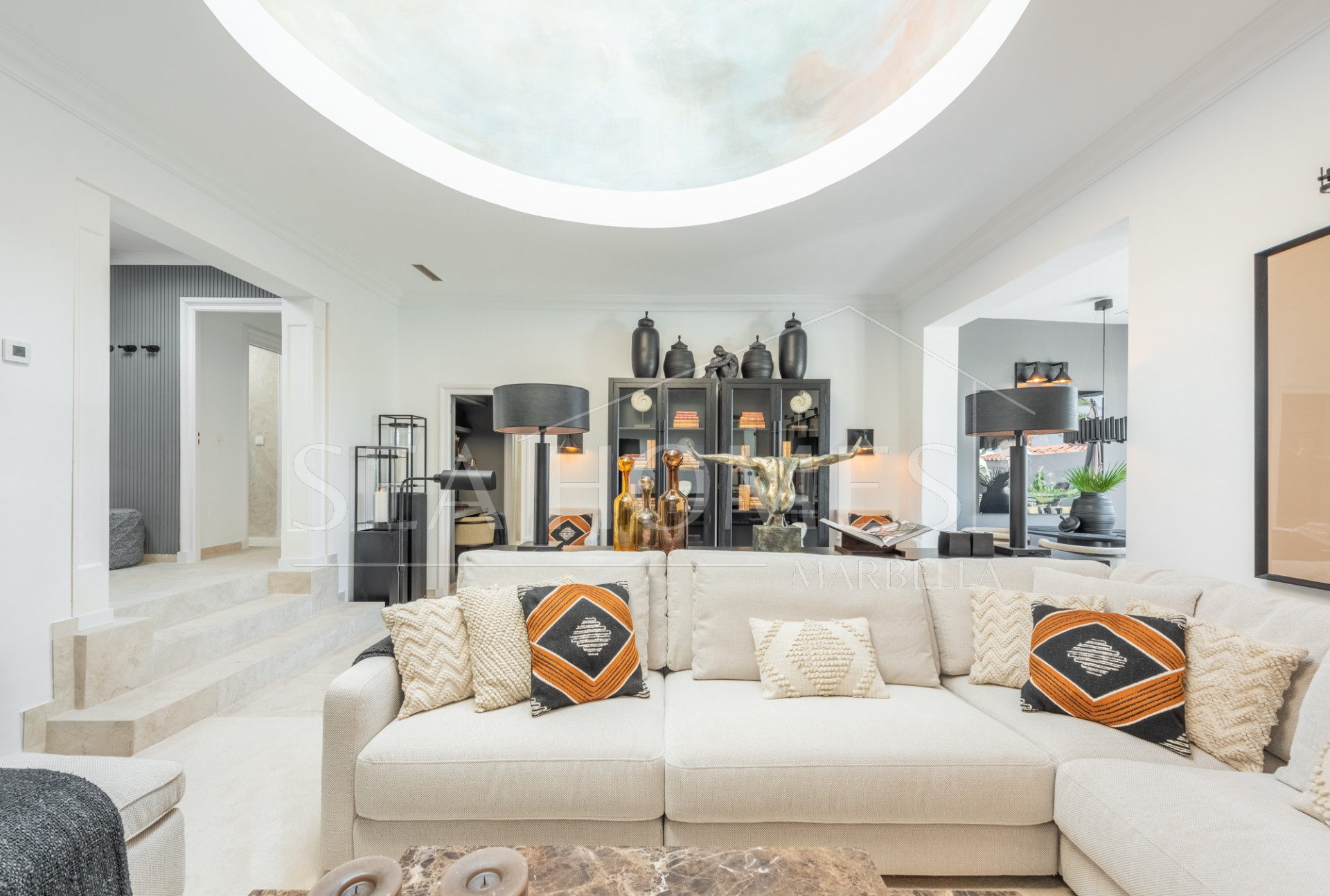 Scandi-style design bungalow in the beachfront Oasis Club on Marbella's Golden Mile.