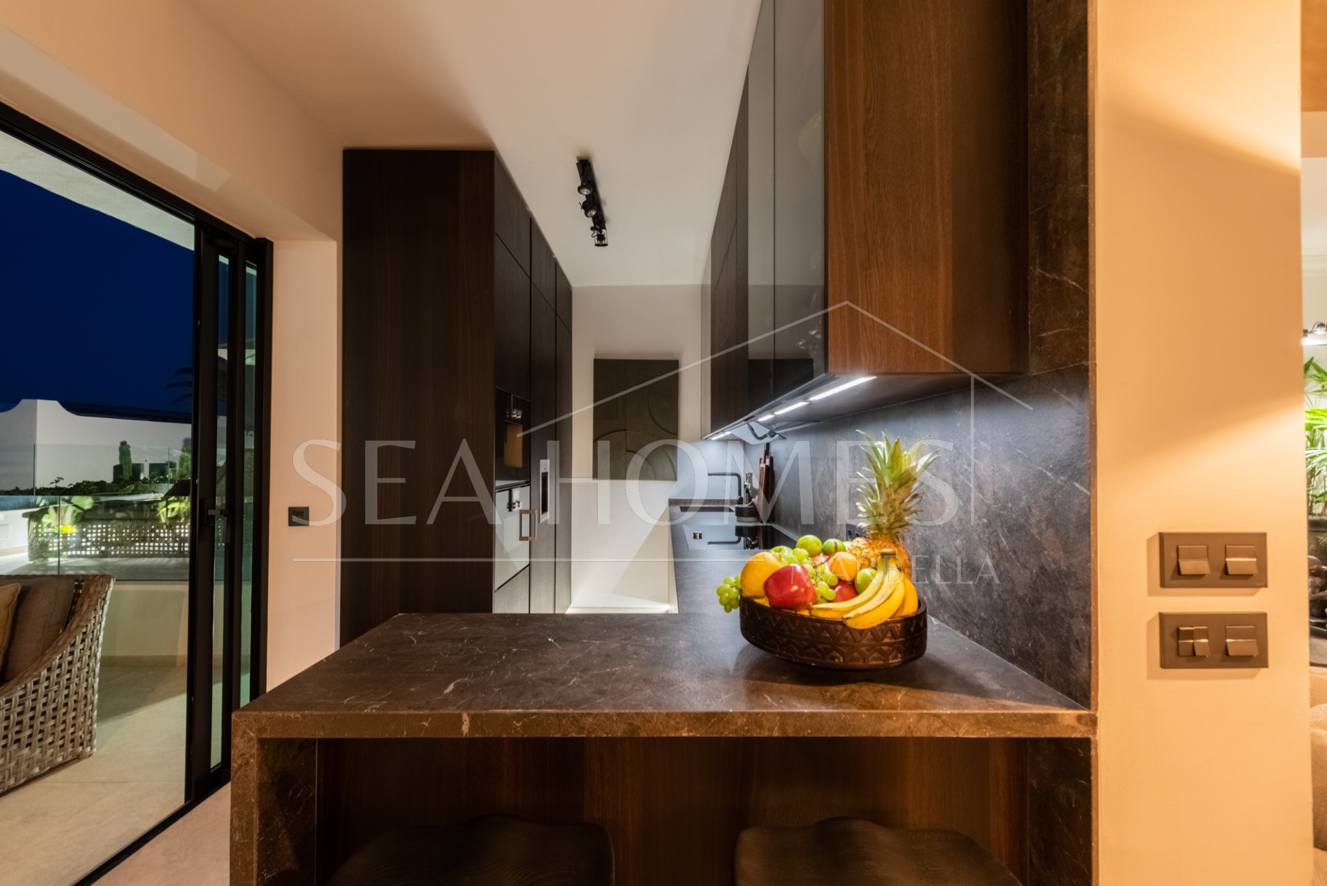 Scandi-style design bungalow in the beachfront Oasis Club on Marbella's Golden Mile.