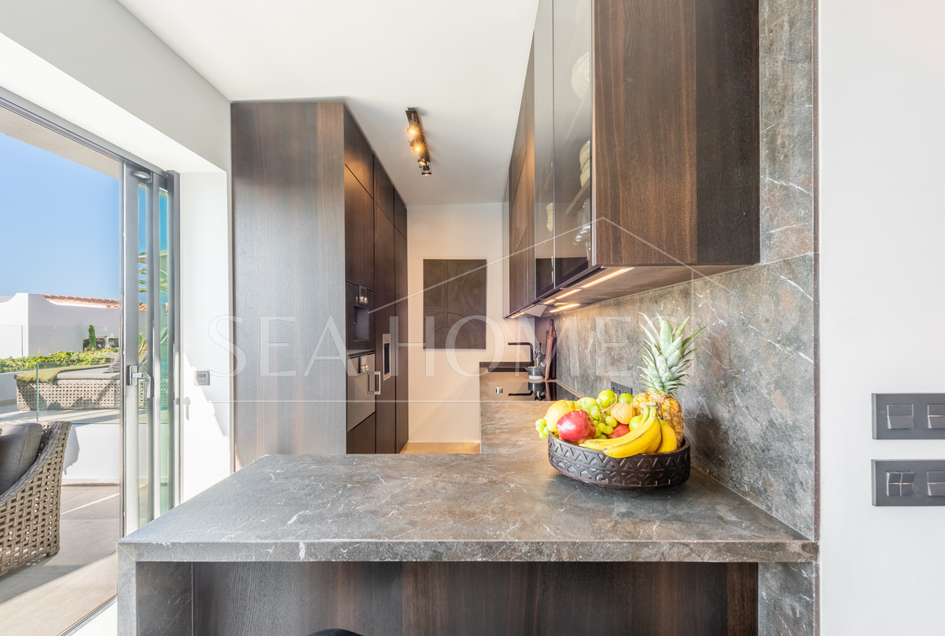 Scandi-style design bungalow in the beachfront Oasis Club on Marbella's Golden Mile.