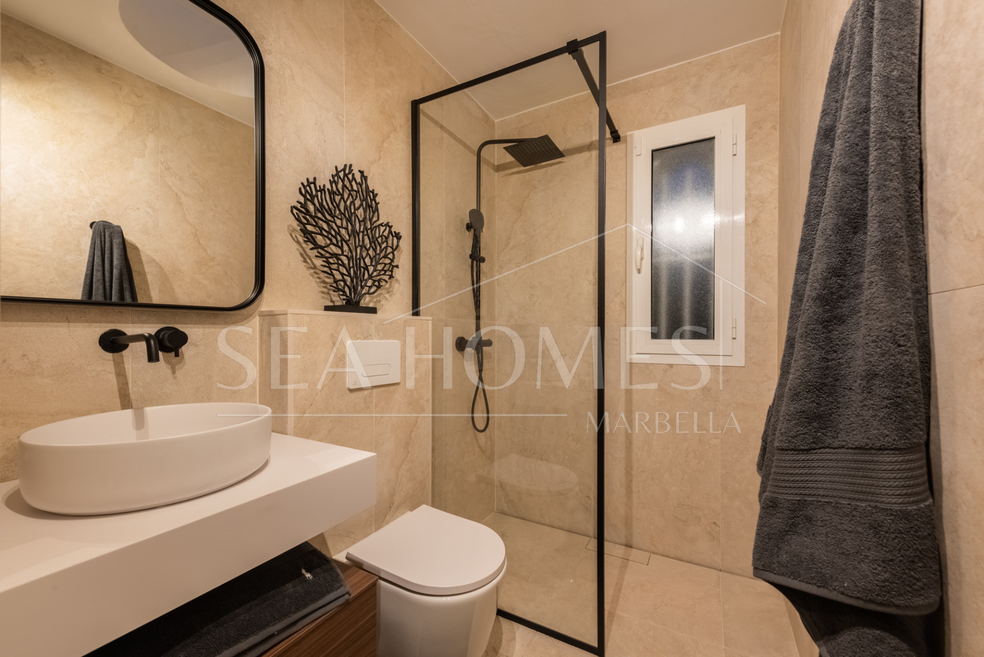 Scandi-style design bungalow in the beachfront Oasis Club on Marbella's Golden Mile.