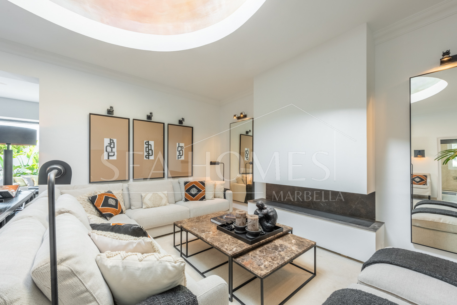Scandi-style design bungalow in the beachfront Oasis Club on Marbella's Golden Mile.