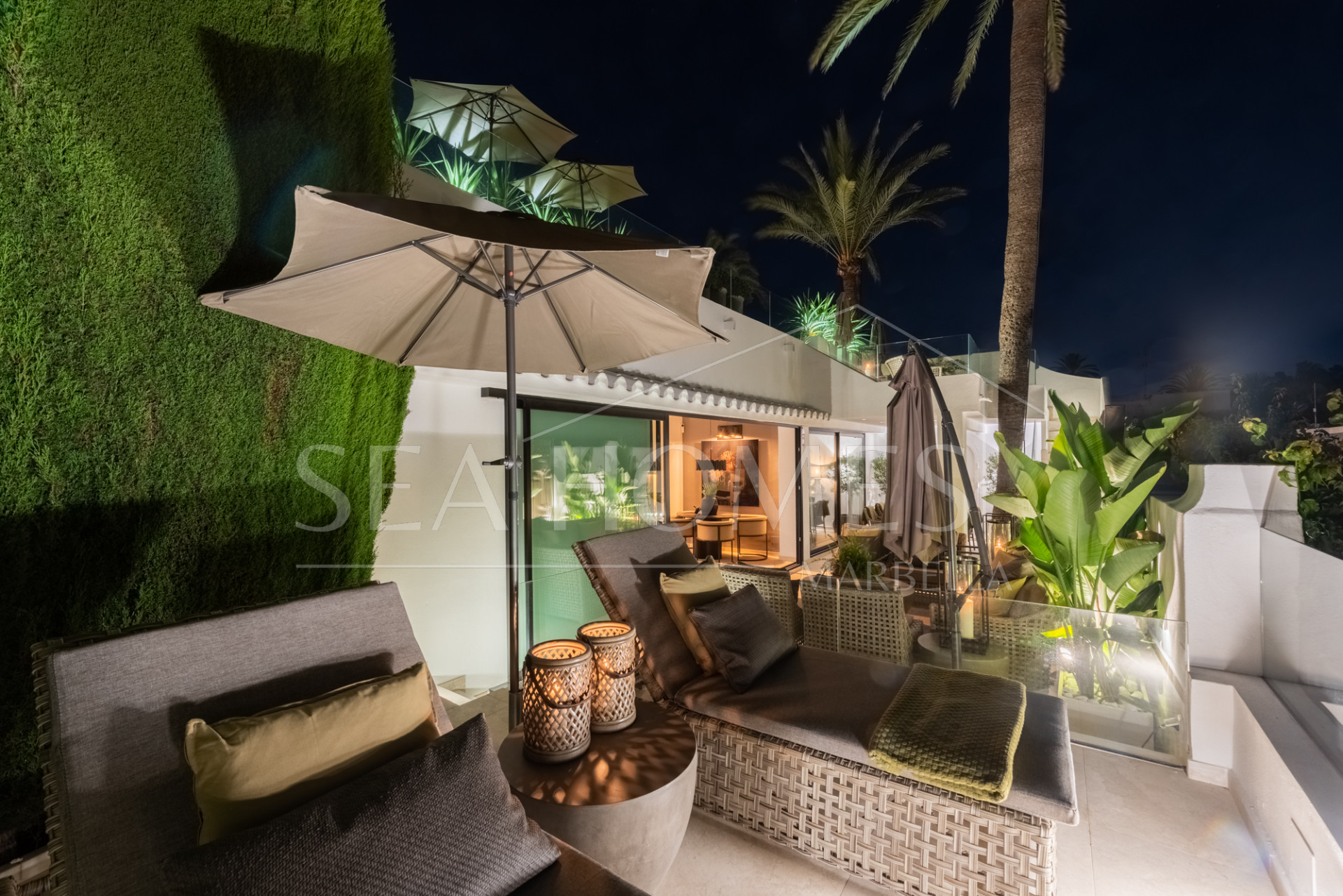 Scandi-style design bungalow in the beachfront Oasis Club on Marbella's Golden Mile.