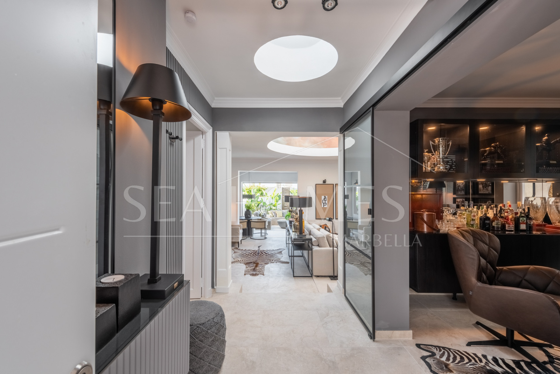 Scandi-style design bungalow in the beachfront Oasis Club on Marbella's Golden Mile.