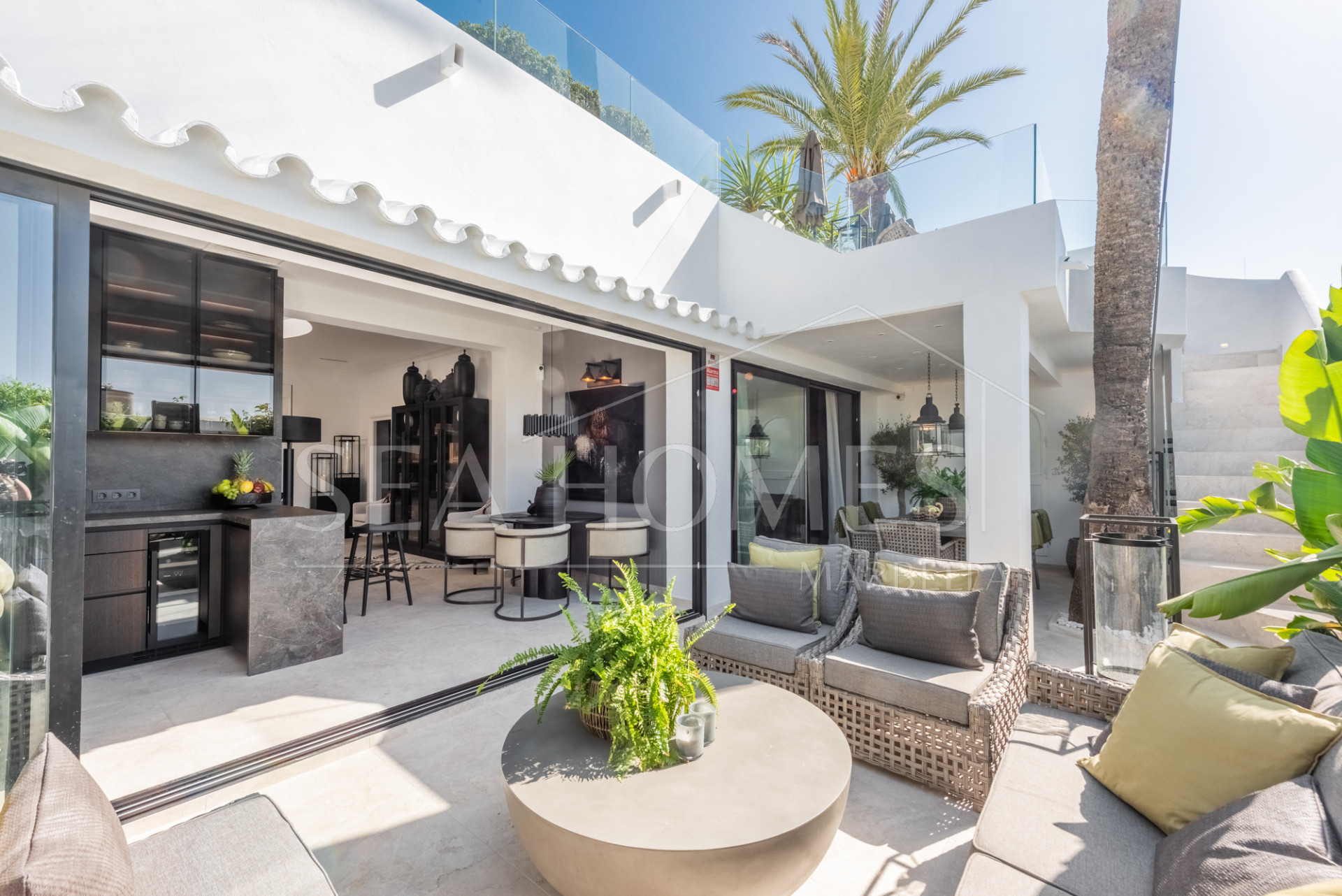 Scandi-style design bungalow in the beachfront Oasis Club on Marbella's Golden Mile.