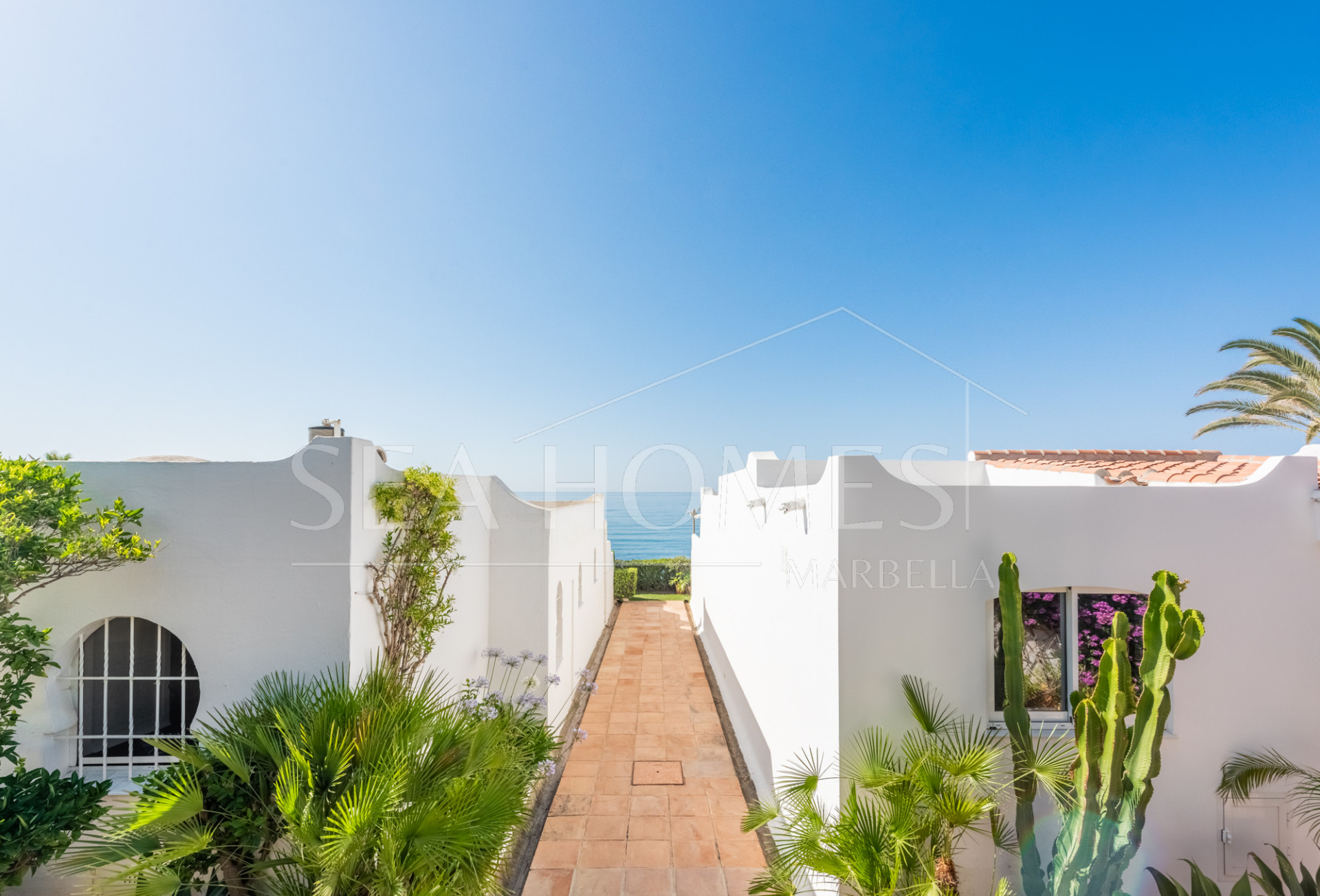 Scandi-style design bungalow in the beachfront Oasis Club on Marbella's Golden Mile.