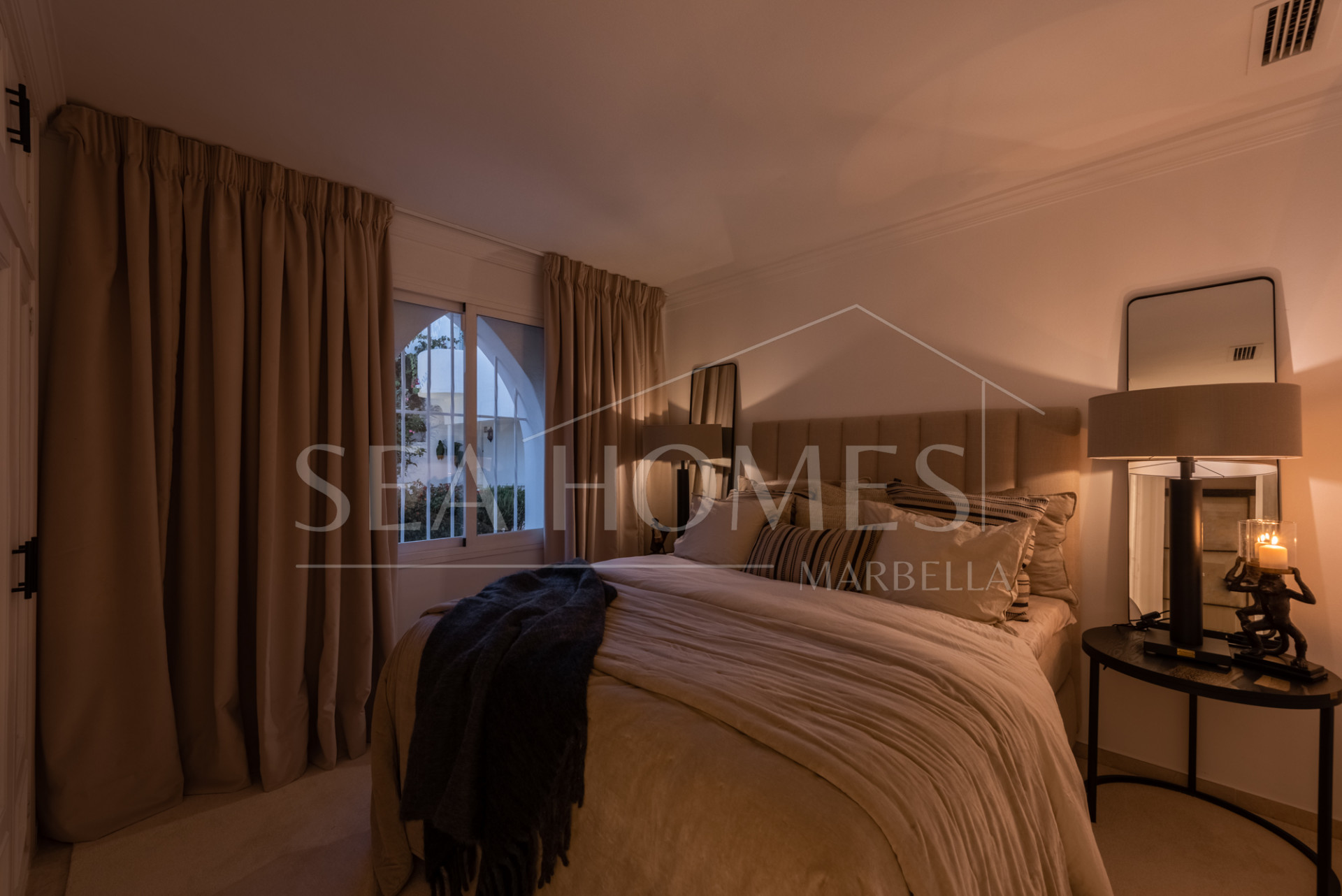 Scandi-style design bungalow in the beachfront Oasis Club on Marbella's Golden Mile.