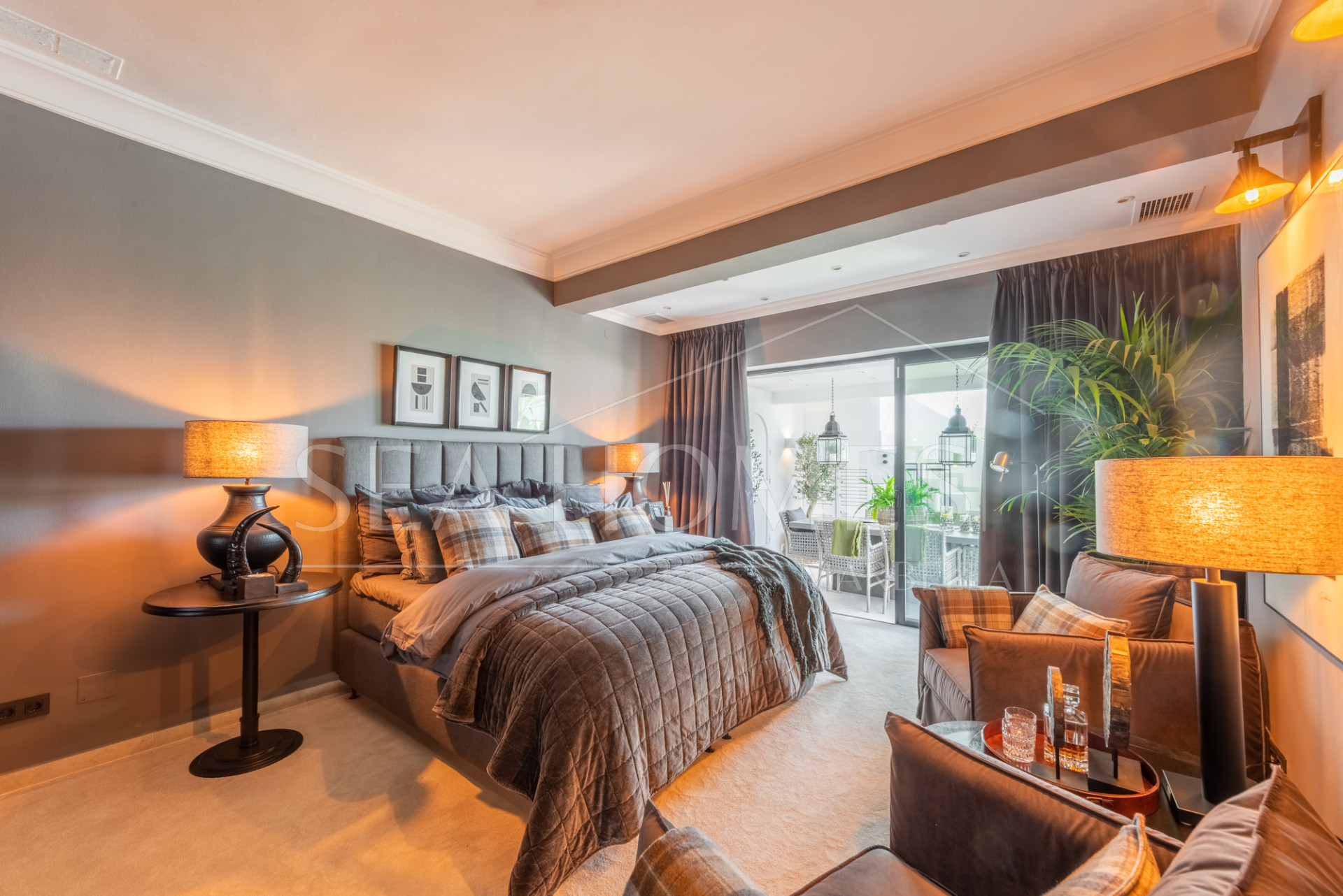 Scandi-style design bungalow in the beachfront Oasis Club on Marbella's Golden Mile.