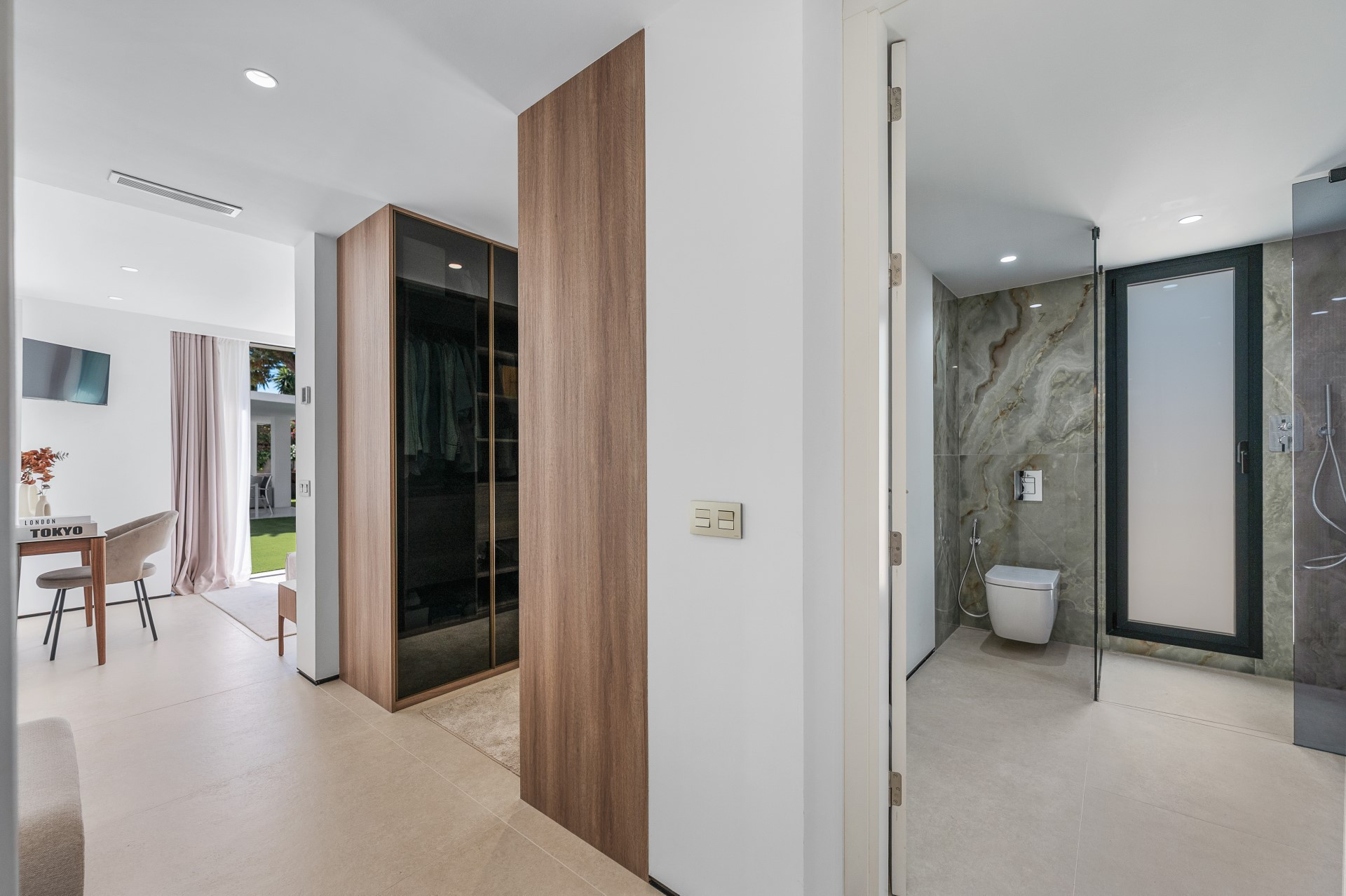 Unique modern 4 bedroom beachside villa in Marbesa