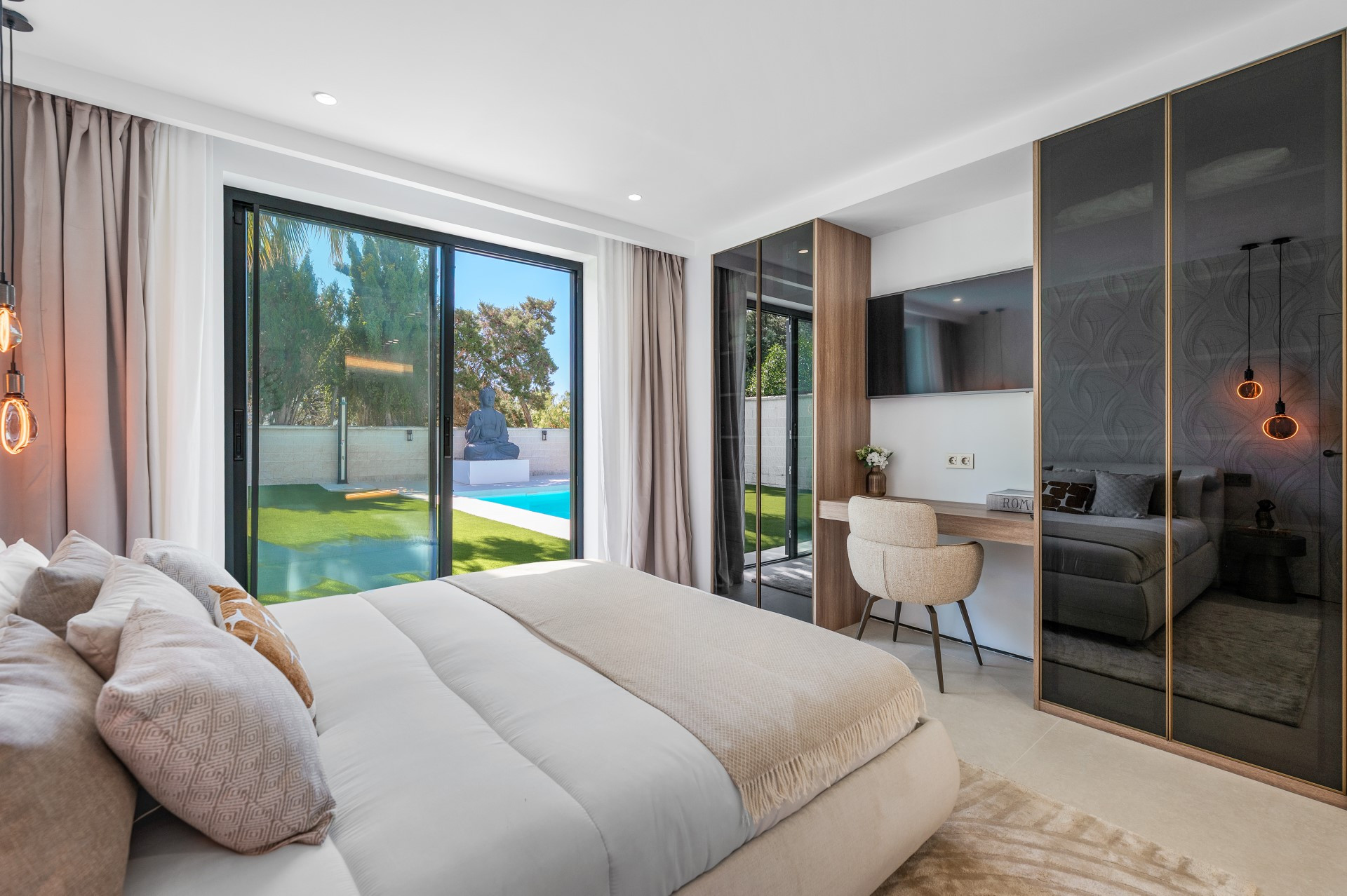 Unique modern 4 bedroom beachside villa in Marbesa