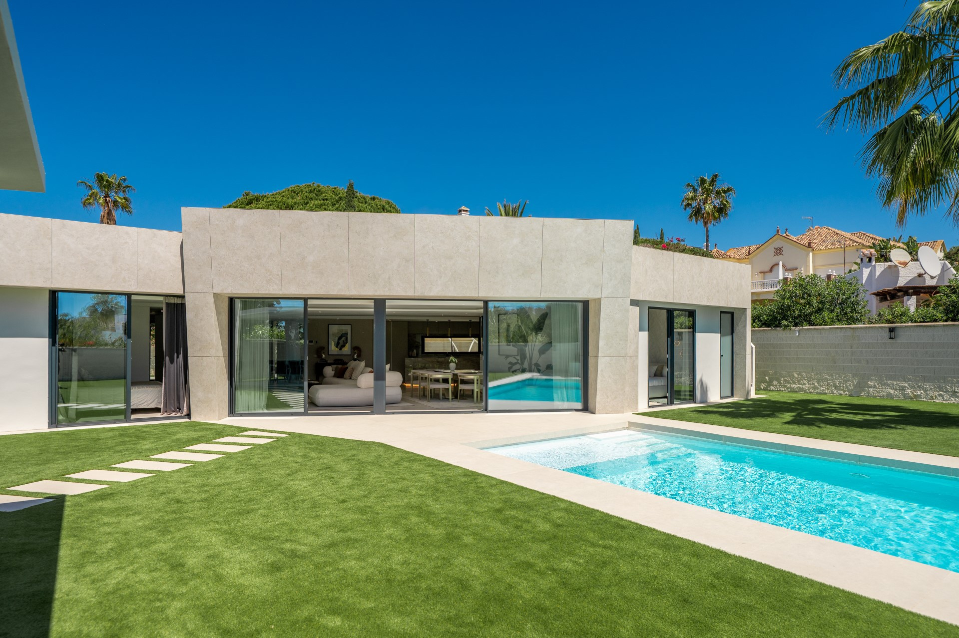Unique modern 4 bedroom beachside villa in Marbesa